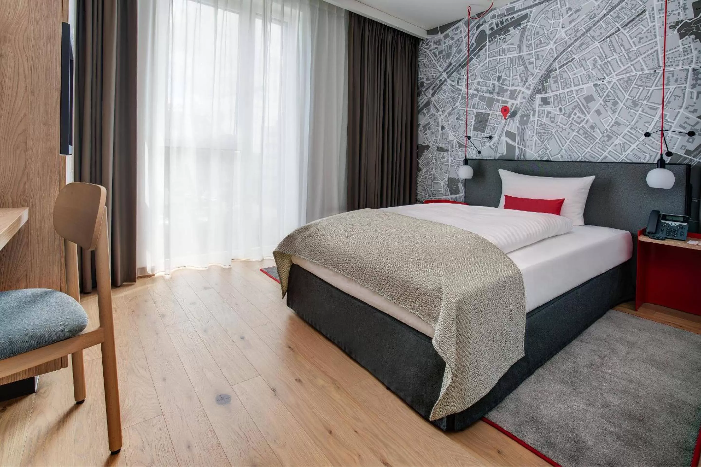 Photo of the whole room, Bed in IntercityHotel Duisburg