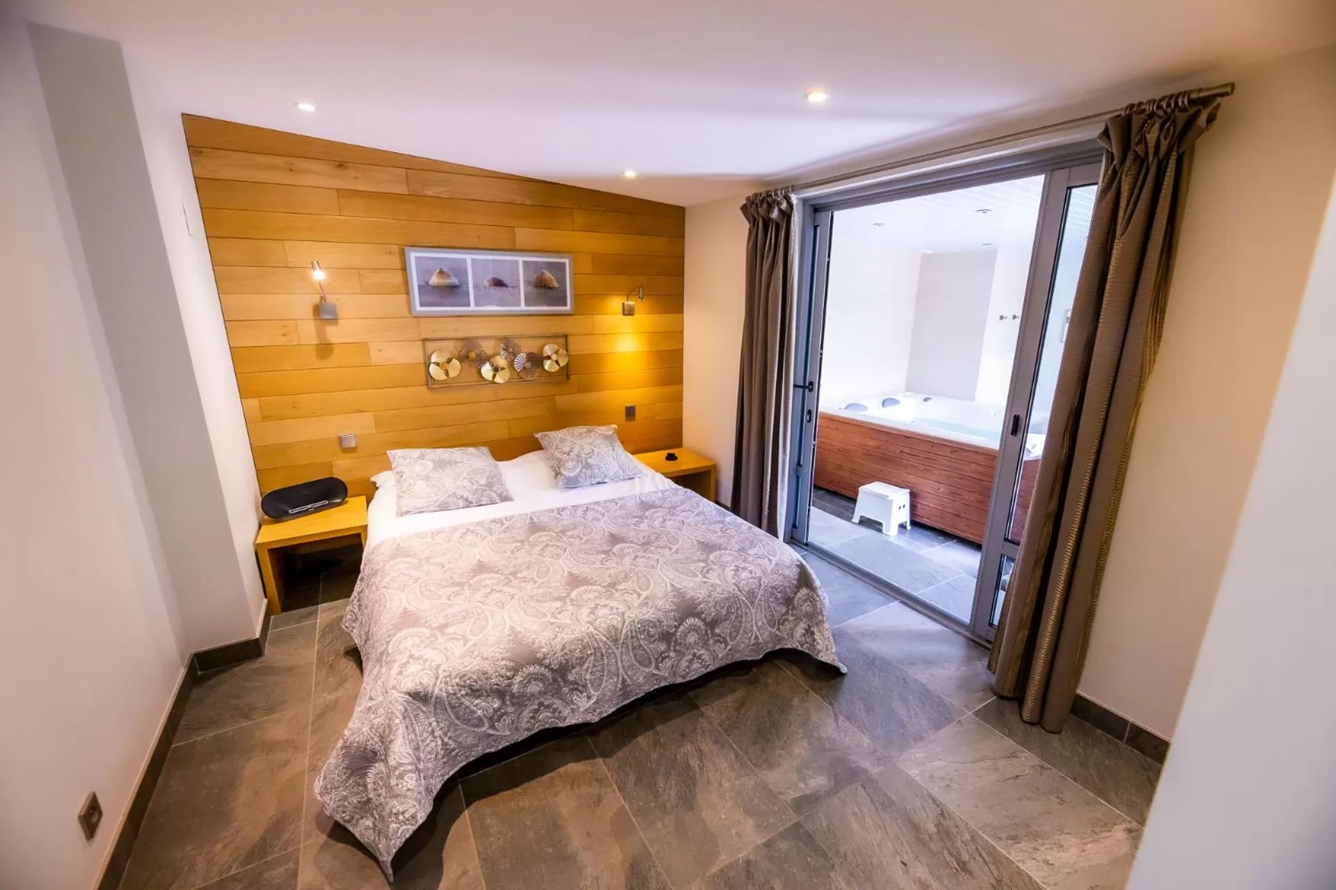 Bed in La Ferme de l'Oudon & SPA