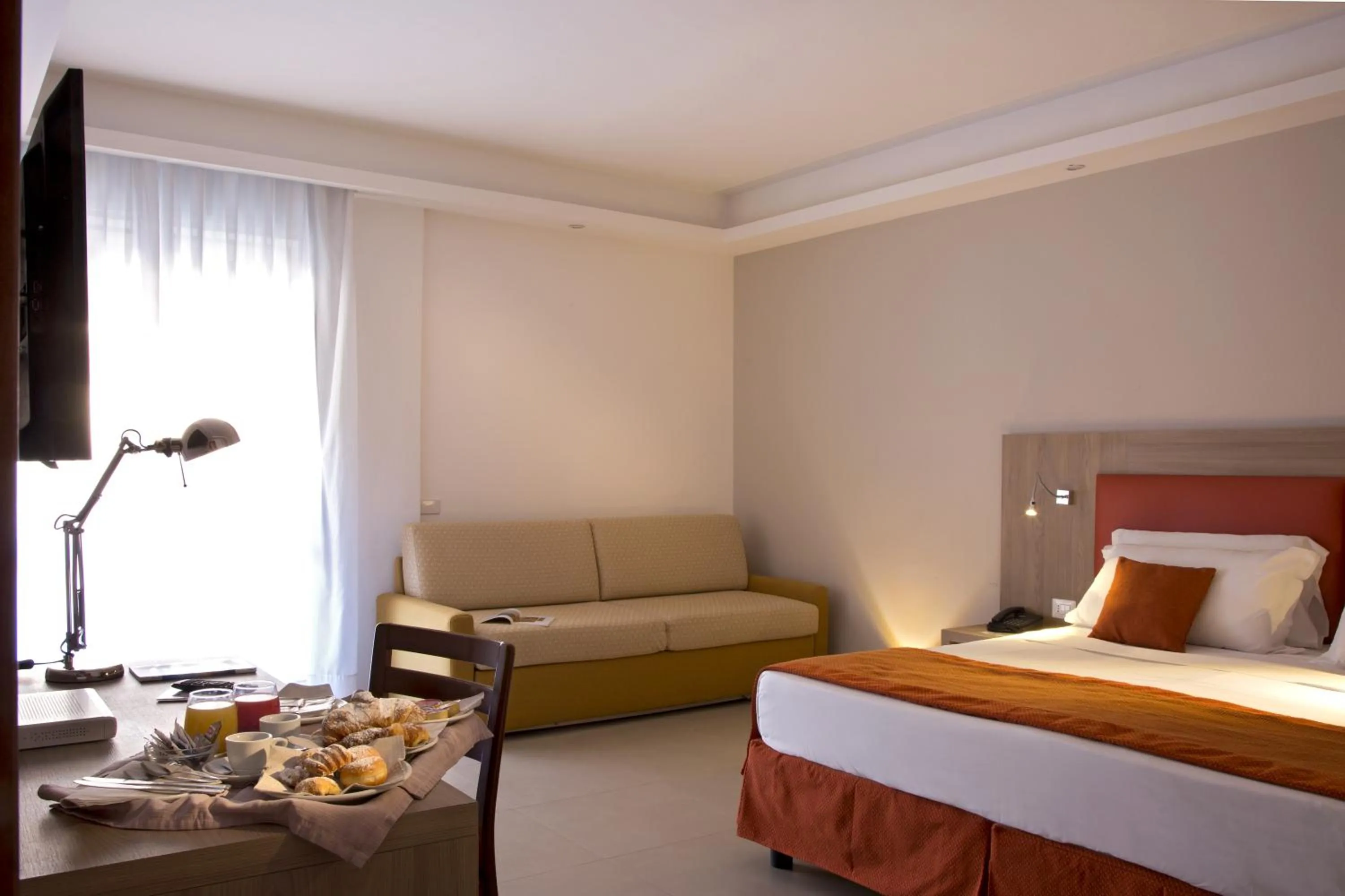 Photo of the whole room, Bed in American Hotel