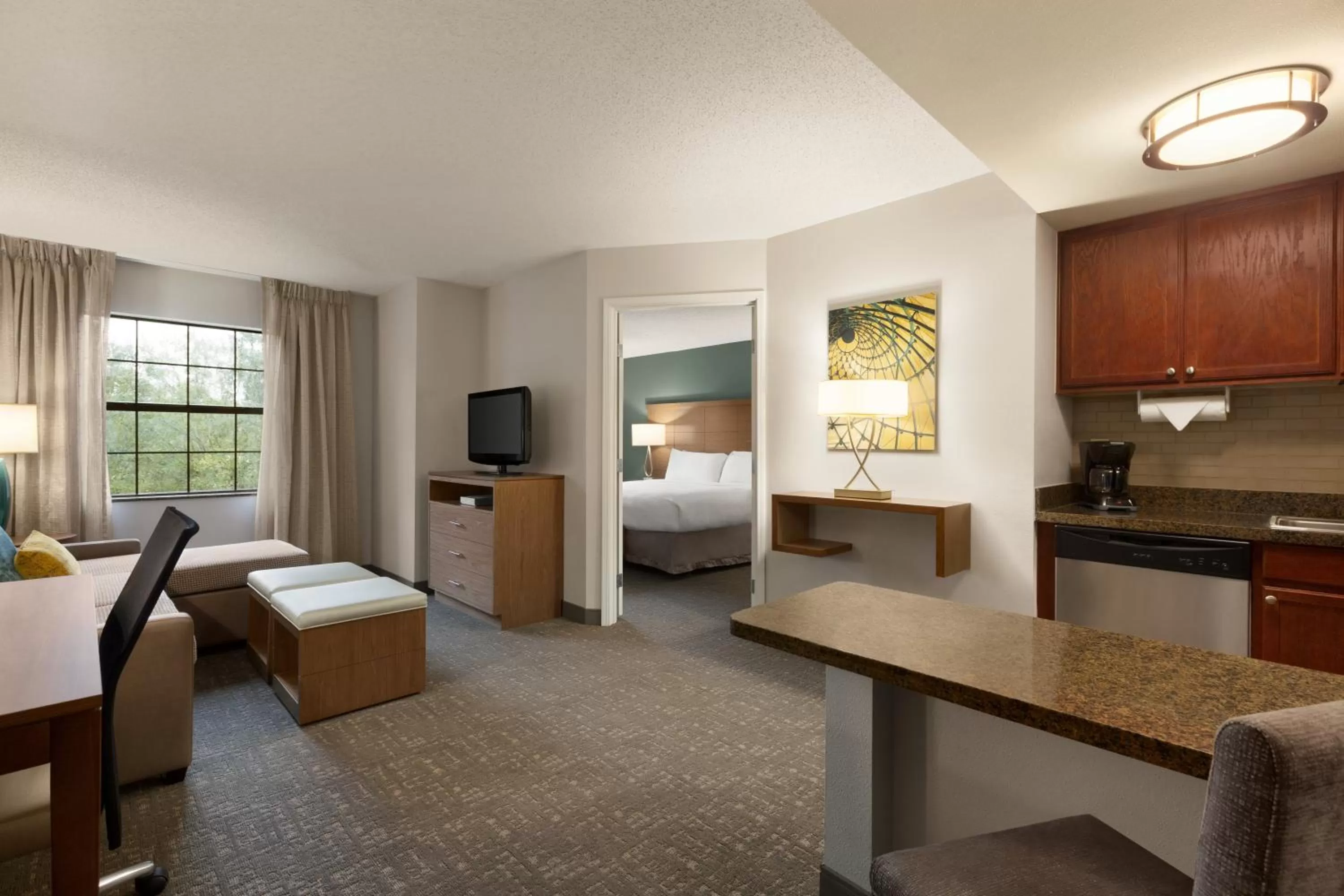 Photo of the whole room, Bed in Staybridge Suites Tampa East- Brandon by IHG