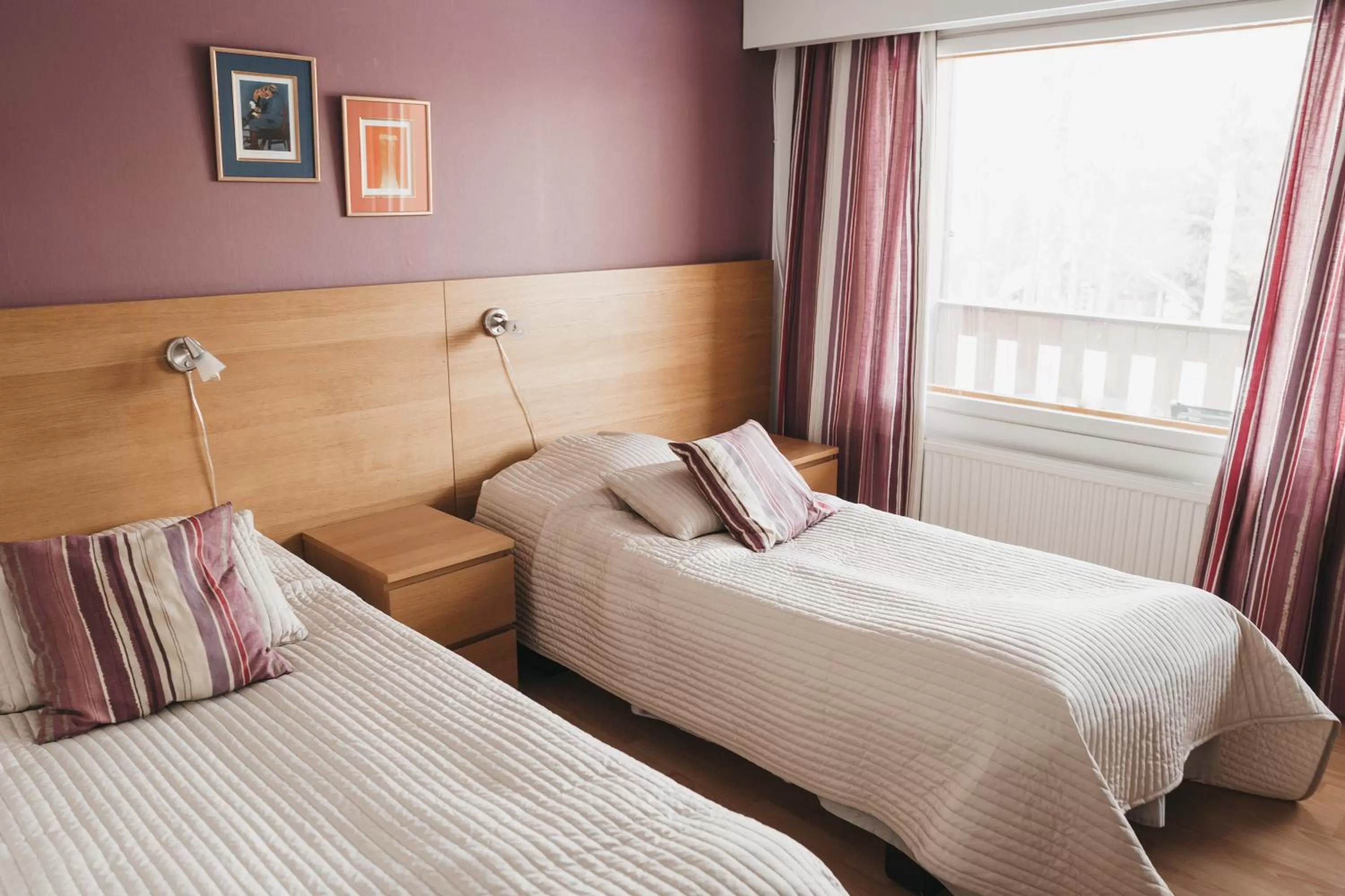 Bed in Revontuli Resort Rooms