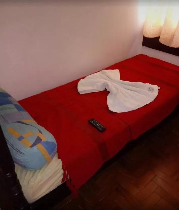 Bed in Pousada Villas