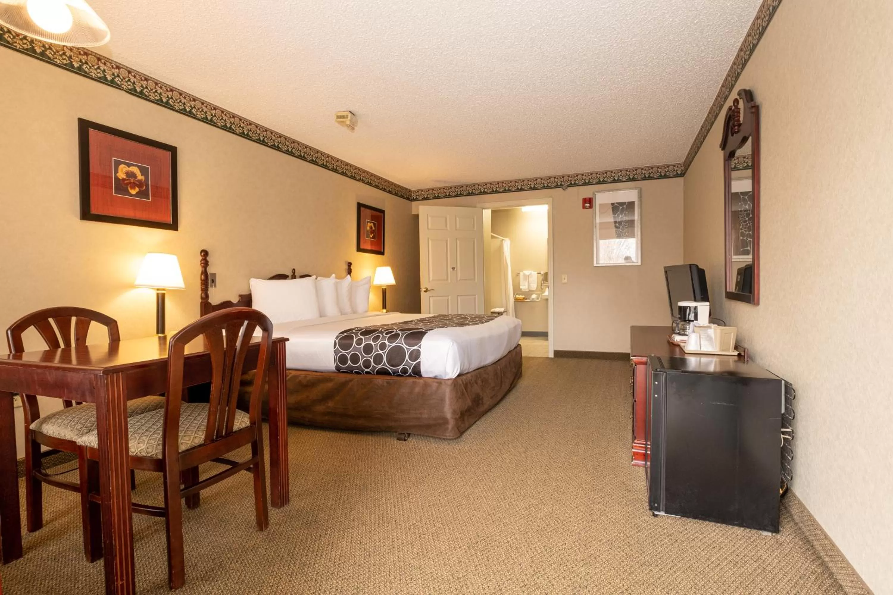 Photo of the whole room, Bed in Hilltop Inn & Suites, near Foxwoods Casino