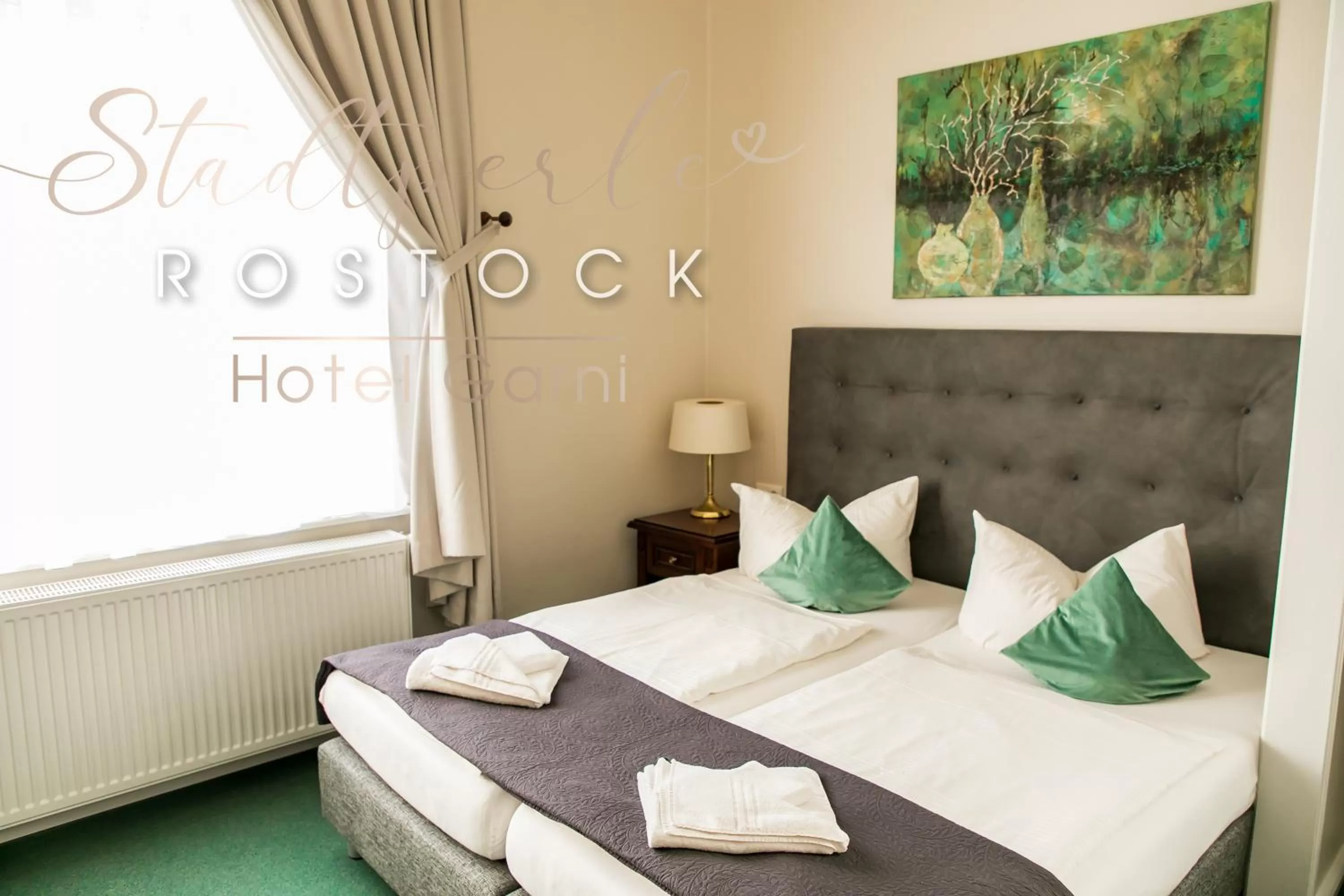 Photo of the whole room, Bed in Stadtperle Rostock