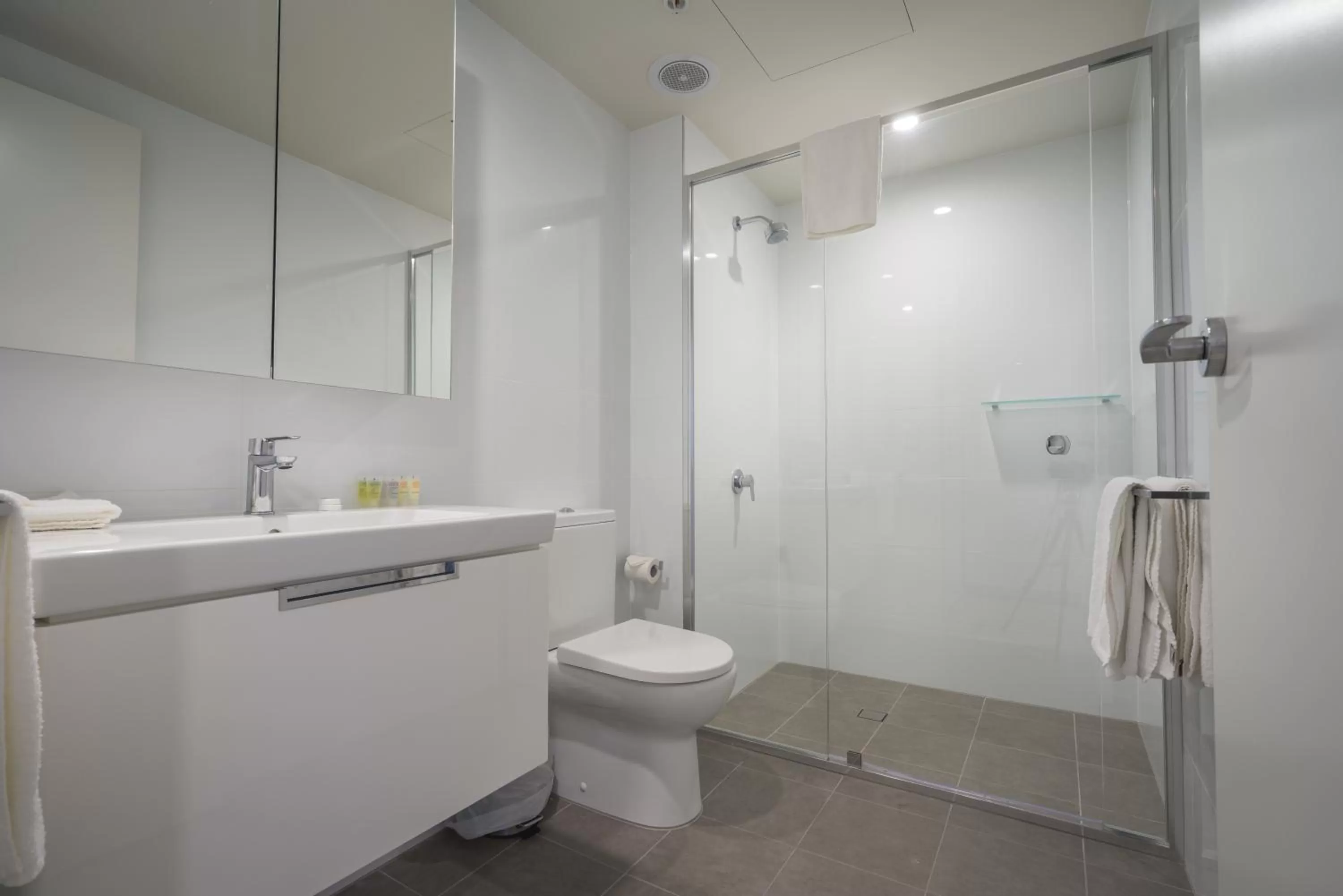 Toilet in Arena Apartments by CLLIX