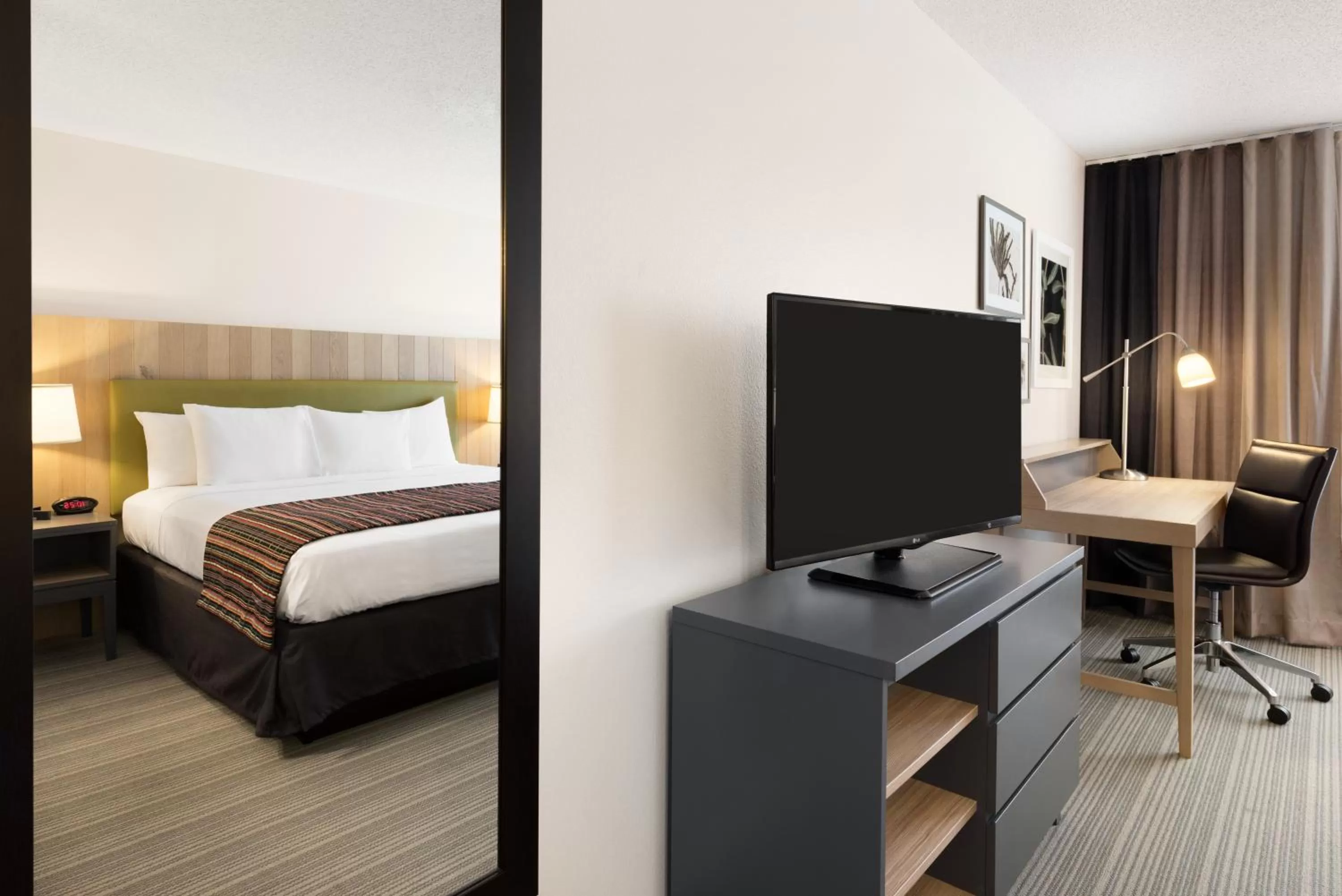 Photo of the whole room in Country Inn & Suites by Radisson, Chippewa Falls, WI