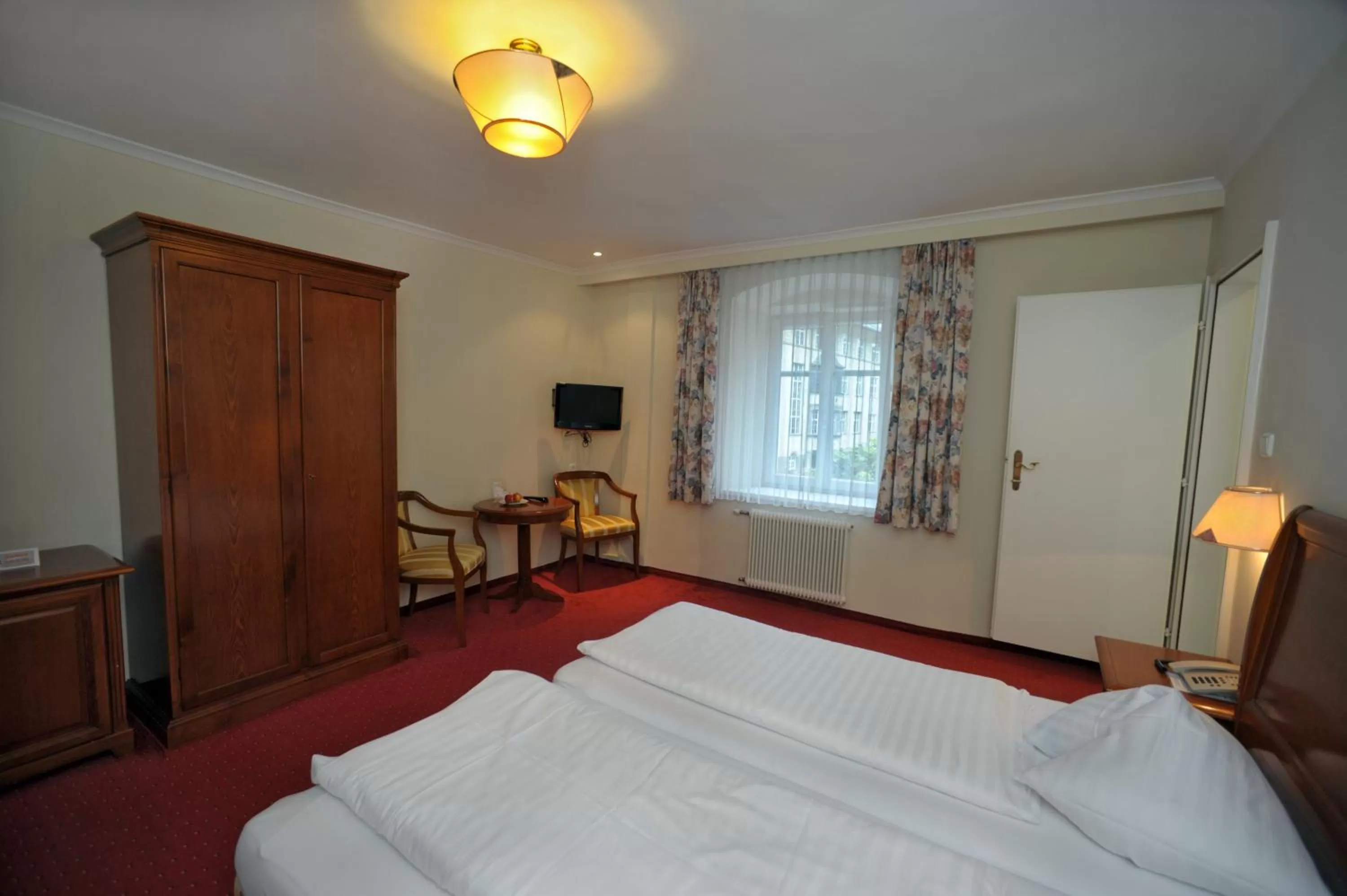 Photo of the whole room, Bed in Hotel Goldener Löwe