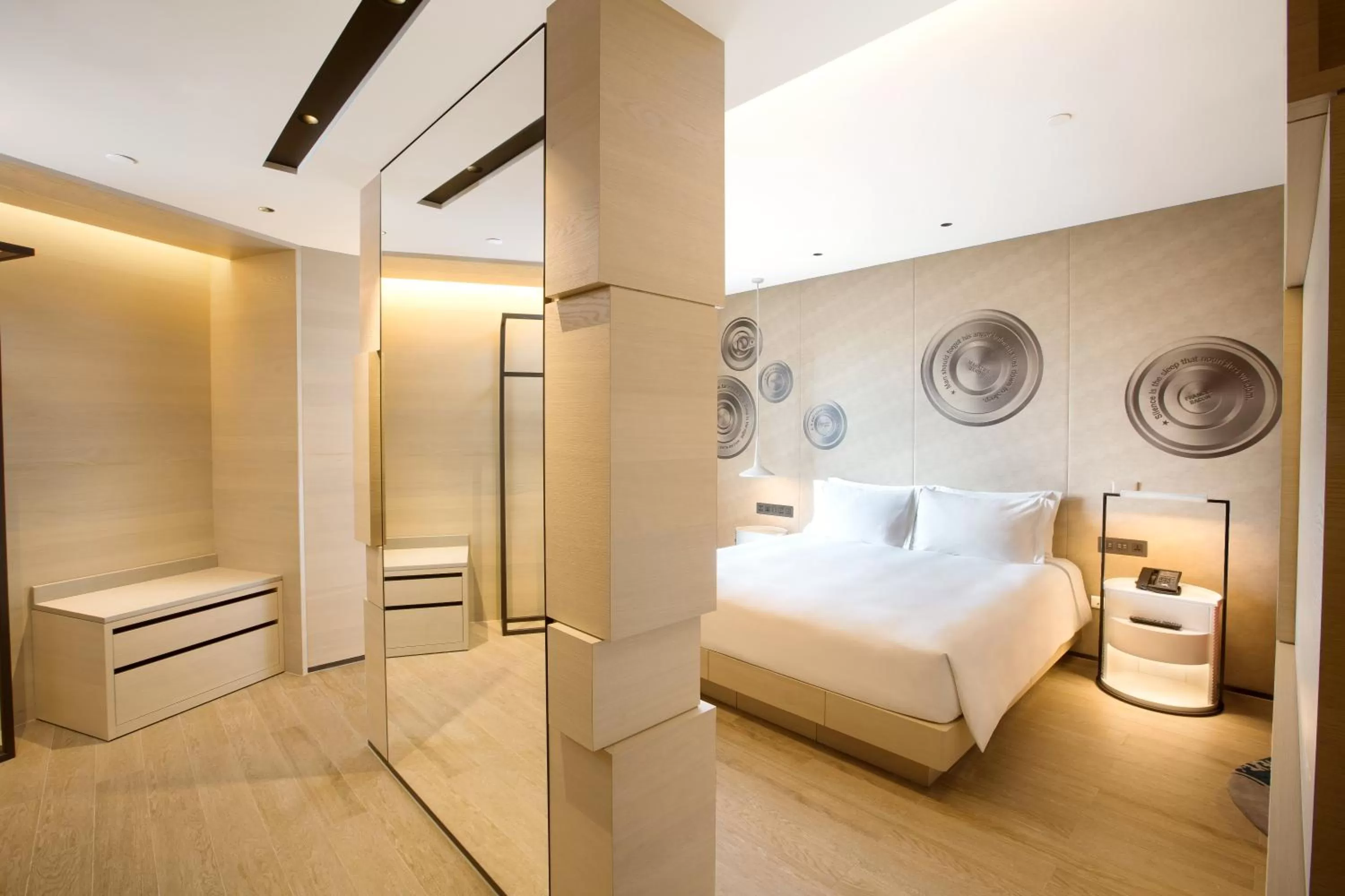 Photo of the whole room, Bed in Hotel Indigo Kaohsiung Central Park by IHG