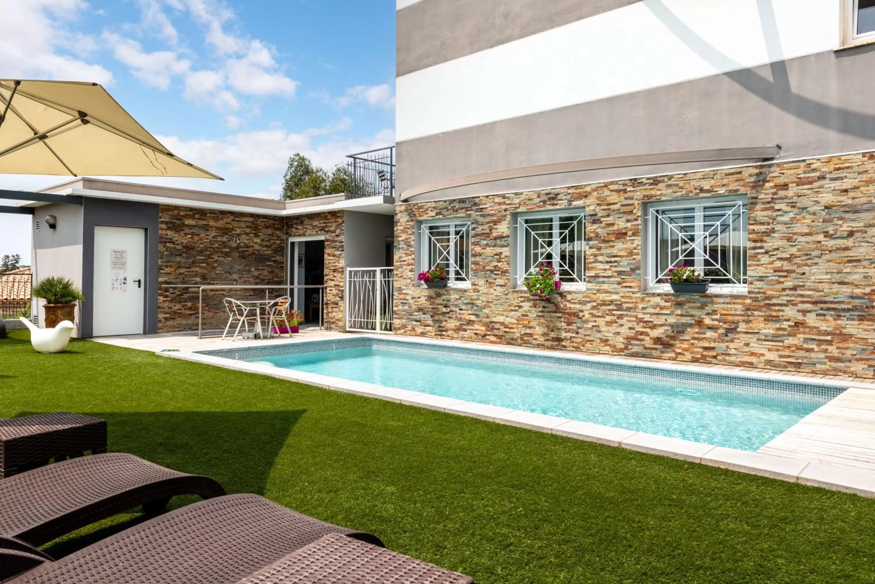 Pool view in Sure Hotel by Best Western Beziers Le Monestie