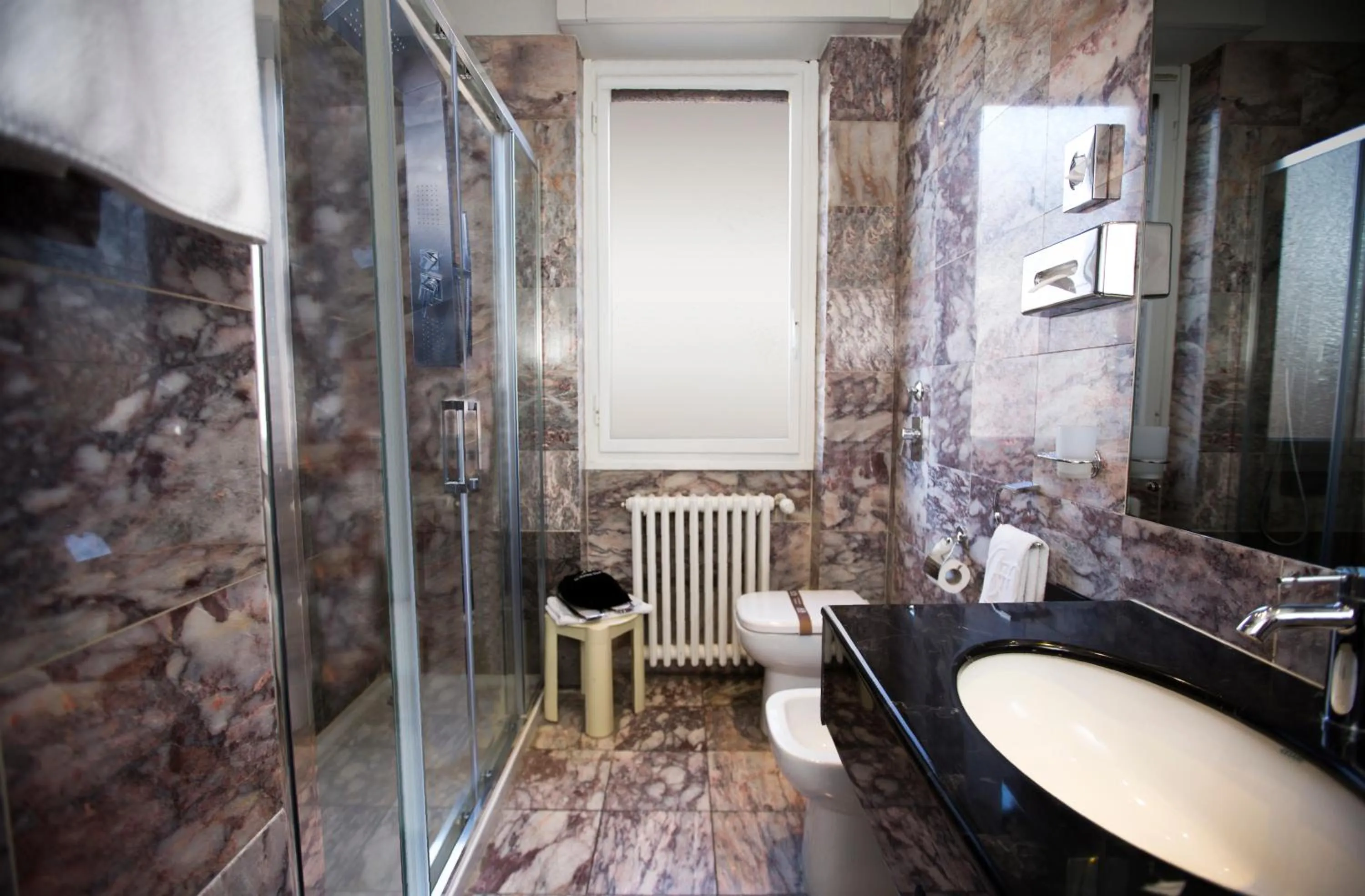 Bathroom in Agape Hotel - AA Hotels