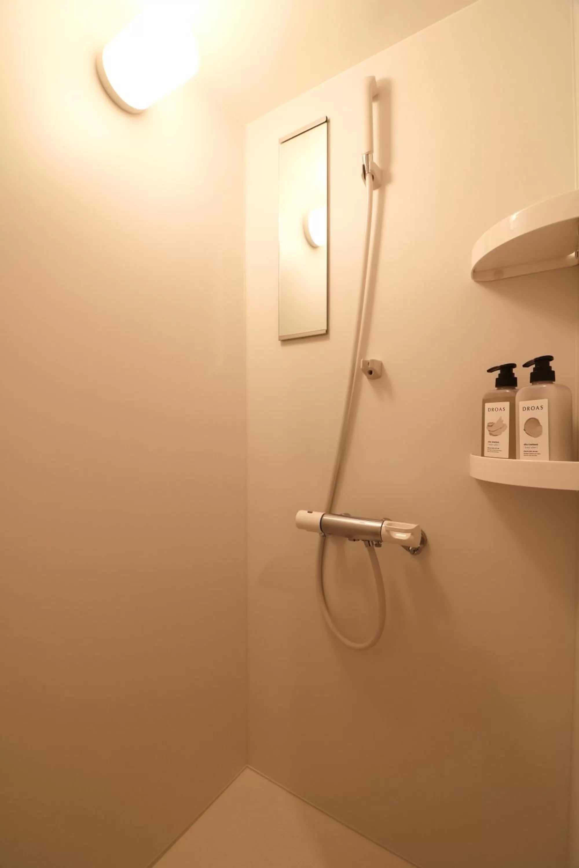 Shower in TAKETO STAY PREMIERE SAPPORO Eki