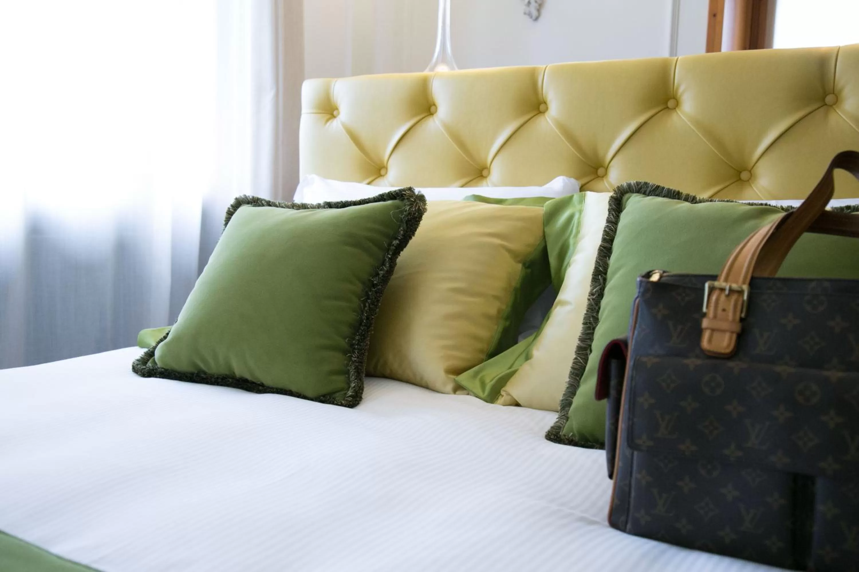 Decorative detail, Bed in Ambra Cortina Luxury&Fashion Hotel
