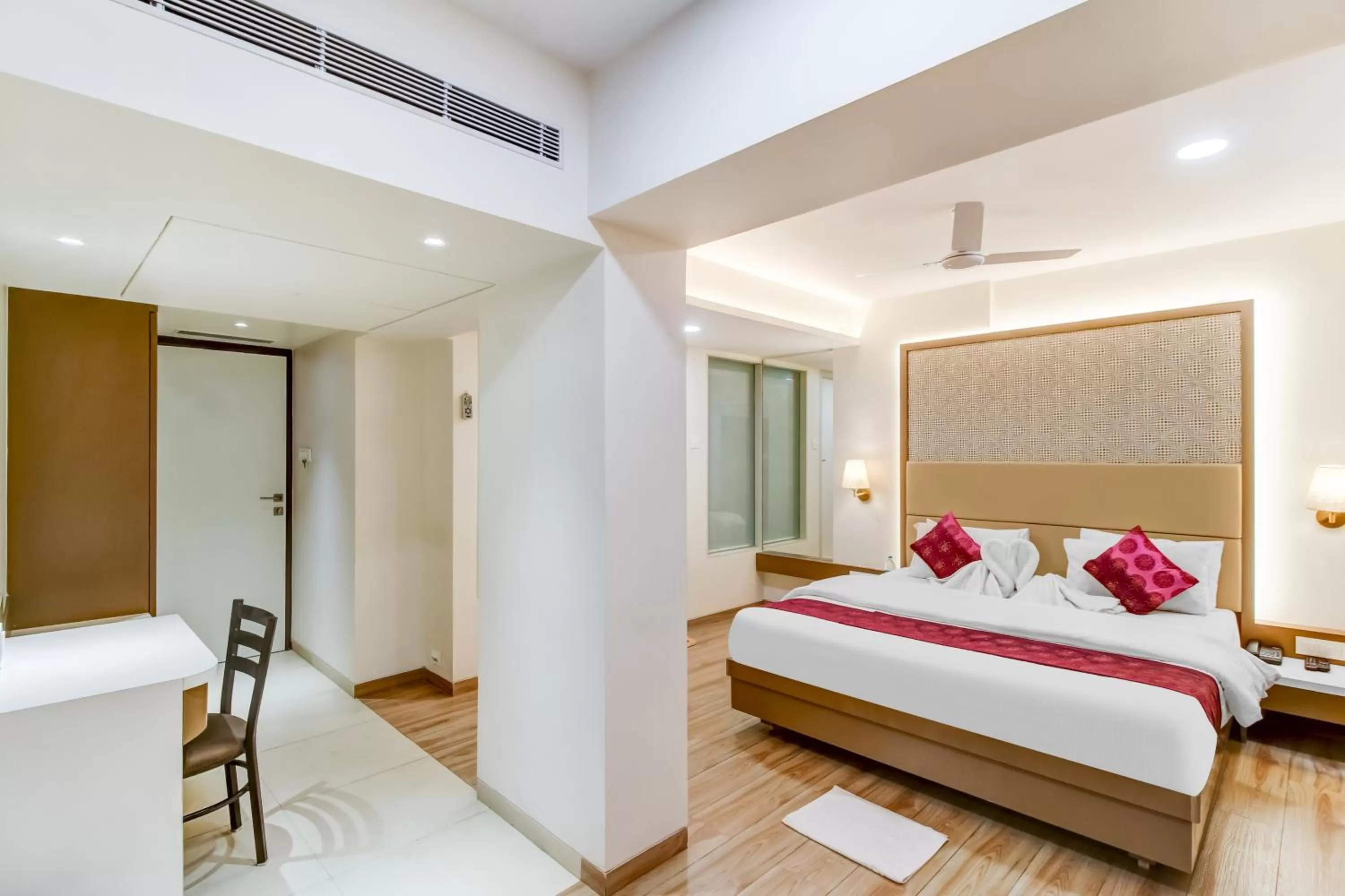 Photo of the whole room, Bed in Grand Mookambika