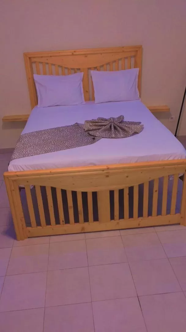 Bed in ILLIYIN Boutique Hotel