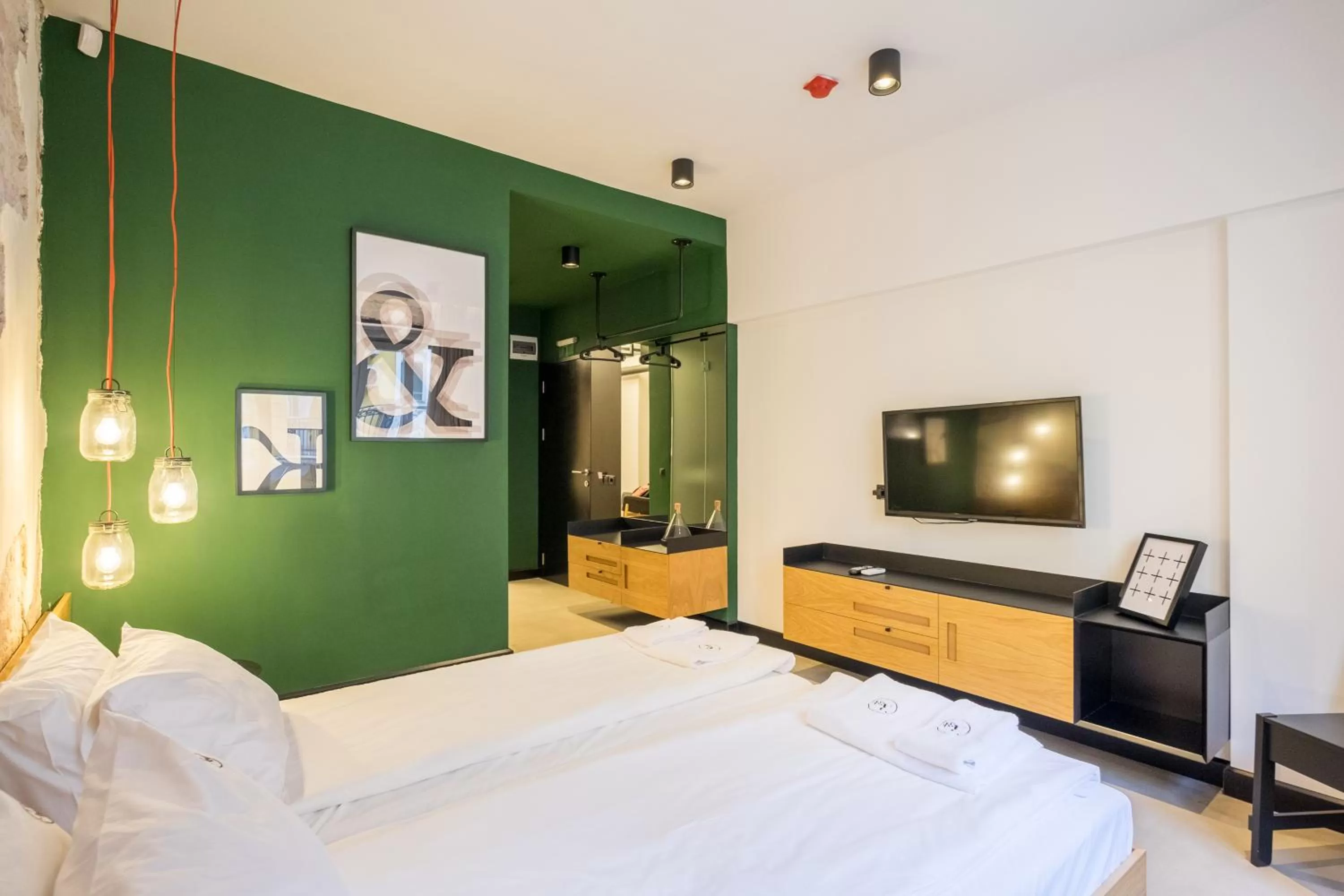 Bed in R34 Boutique Hotel