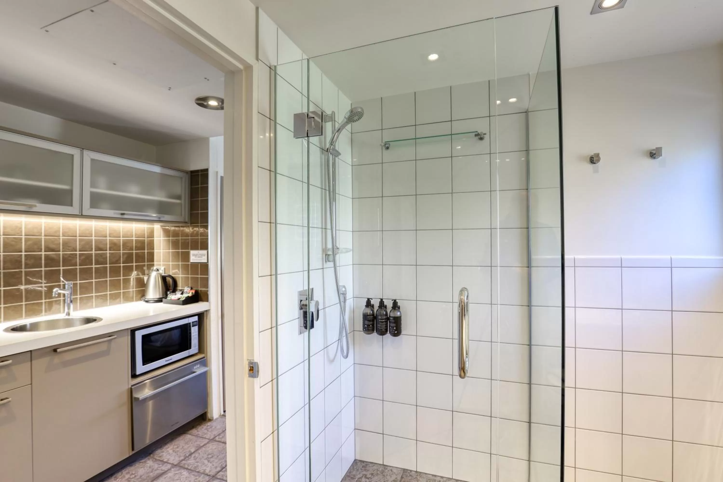 Bathroom in Garden Court Suites & Apartments