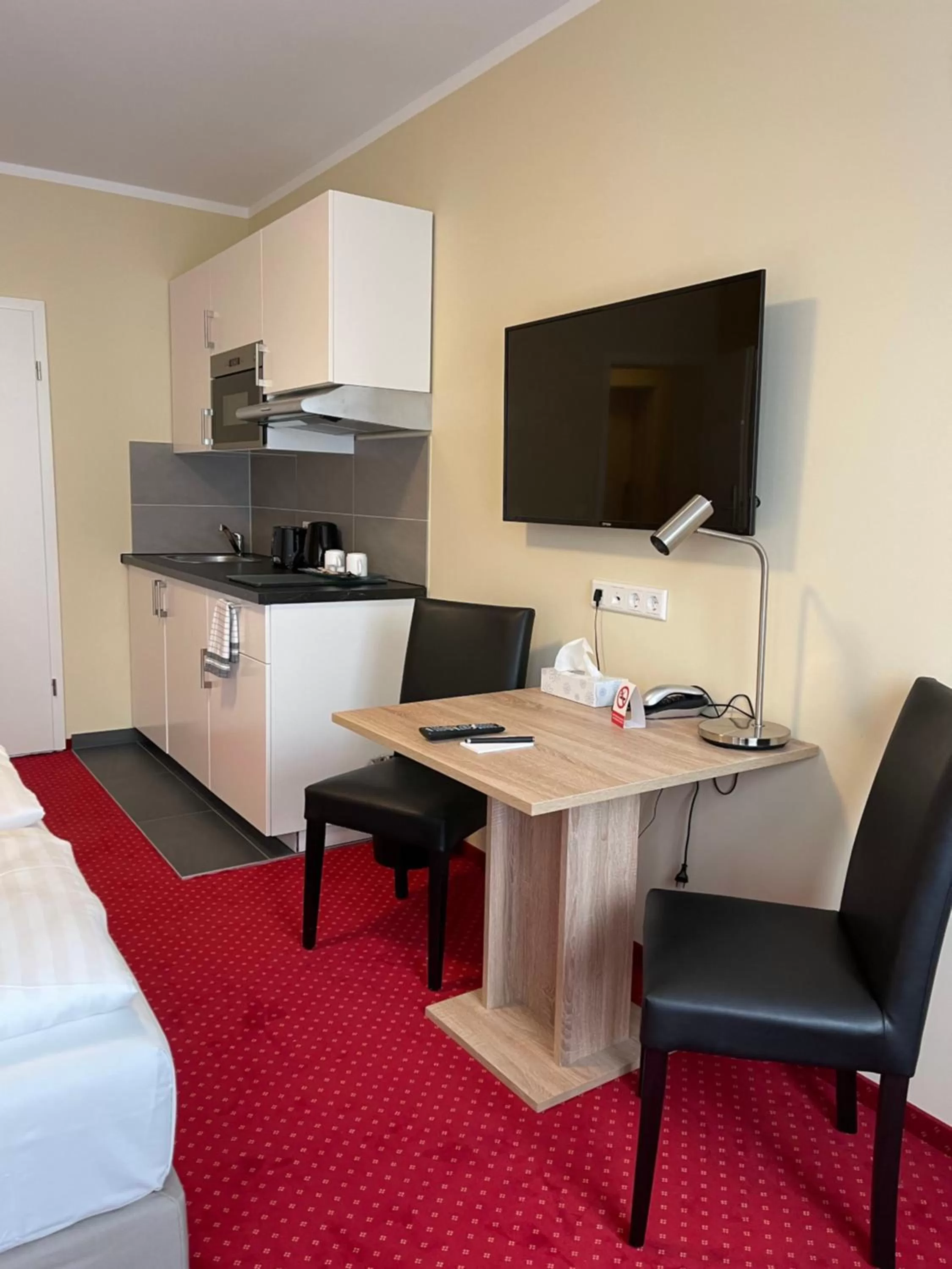 Kitchen or kitchenette in Palm Premium Hotel & Apartments