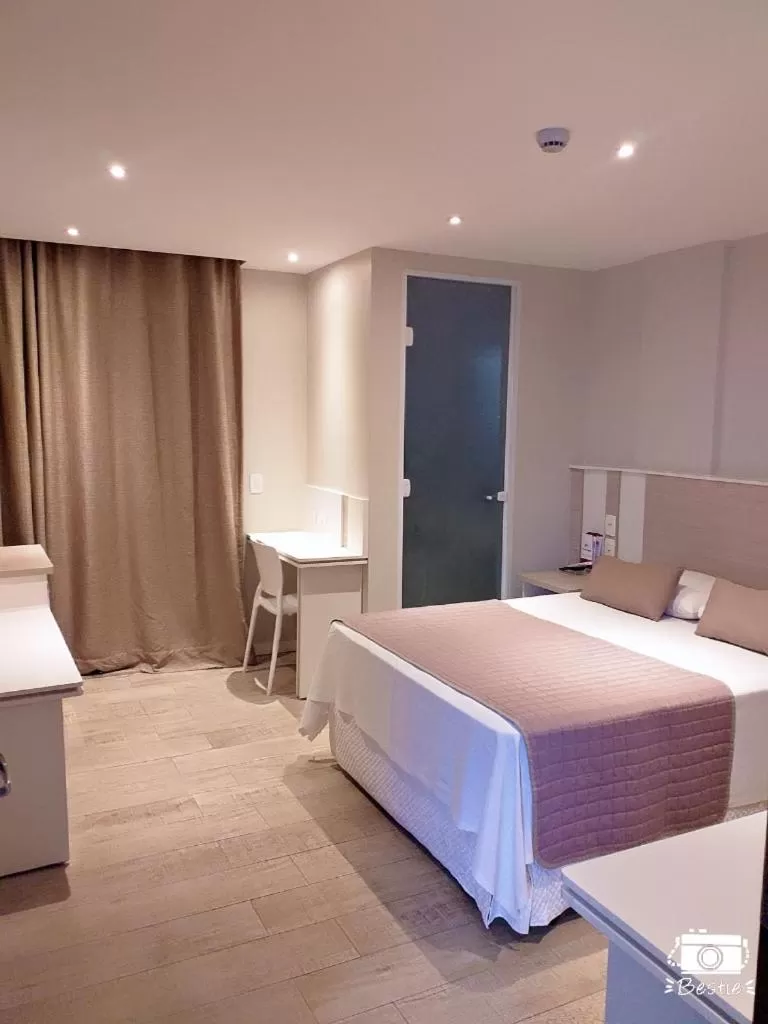 Bed in Jandira Premiêr Hotel