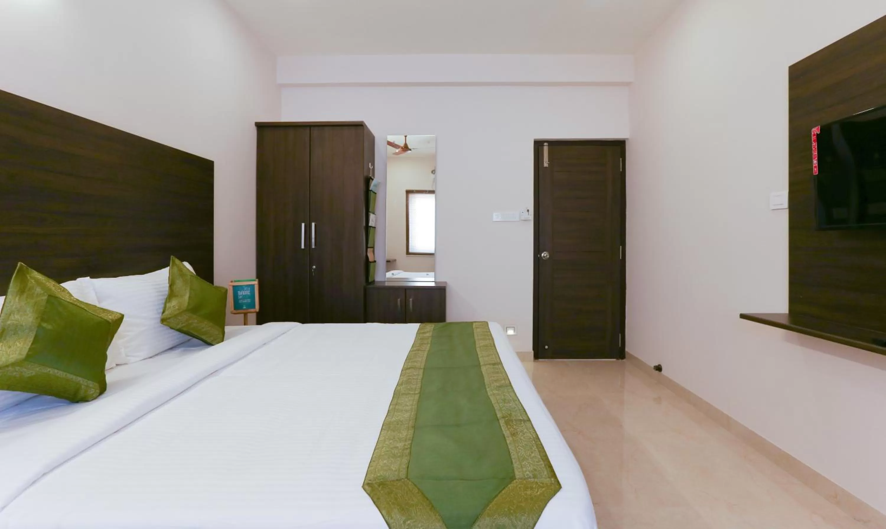 Bedroom, Bed in Treebo Hi Line Apartments Kalapatti