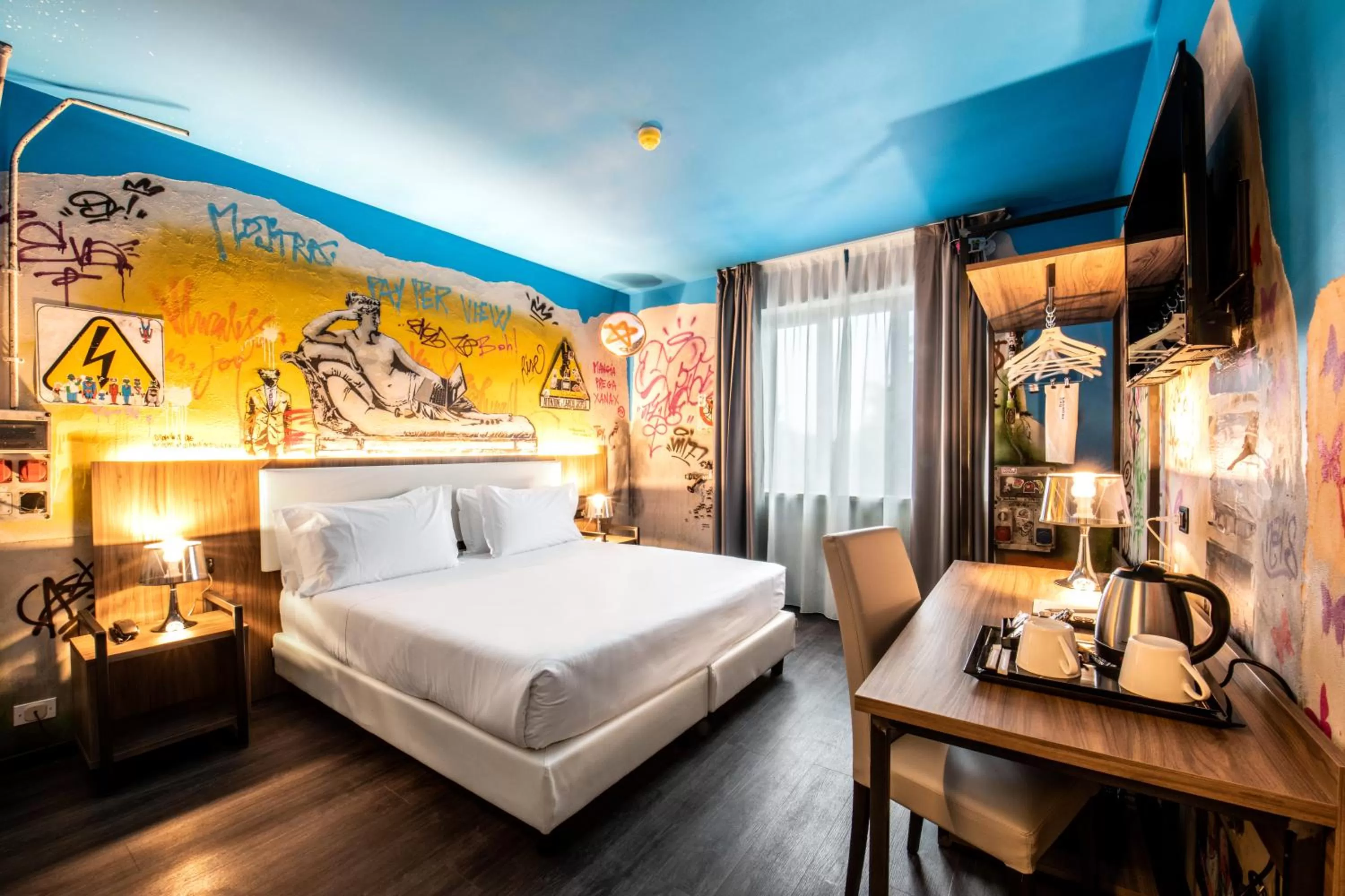 Bed in Muraless Art Hotel - WorldHotels Crafted