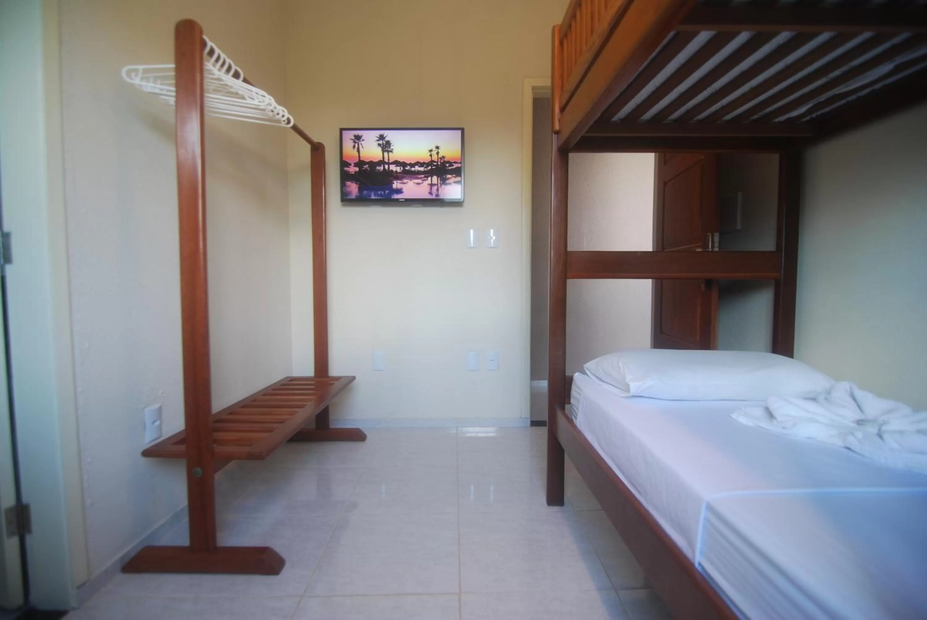 Bed in Refúgio Pousada Fortaleza