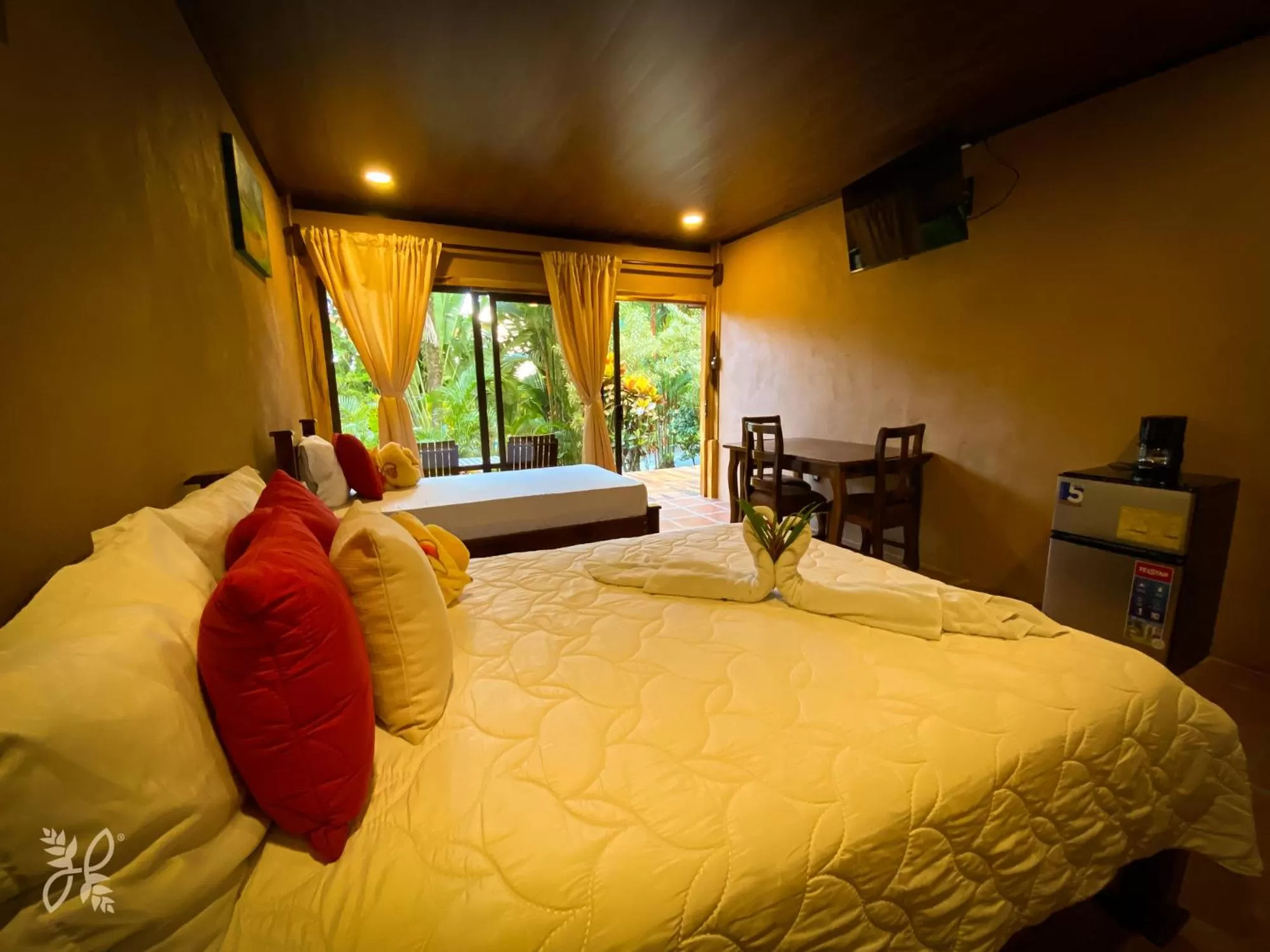 Photo of the whole room, Bed in Hotel Heliconias Nature Inn & Hot Springs