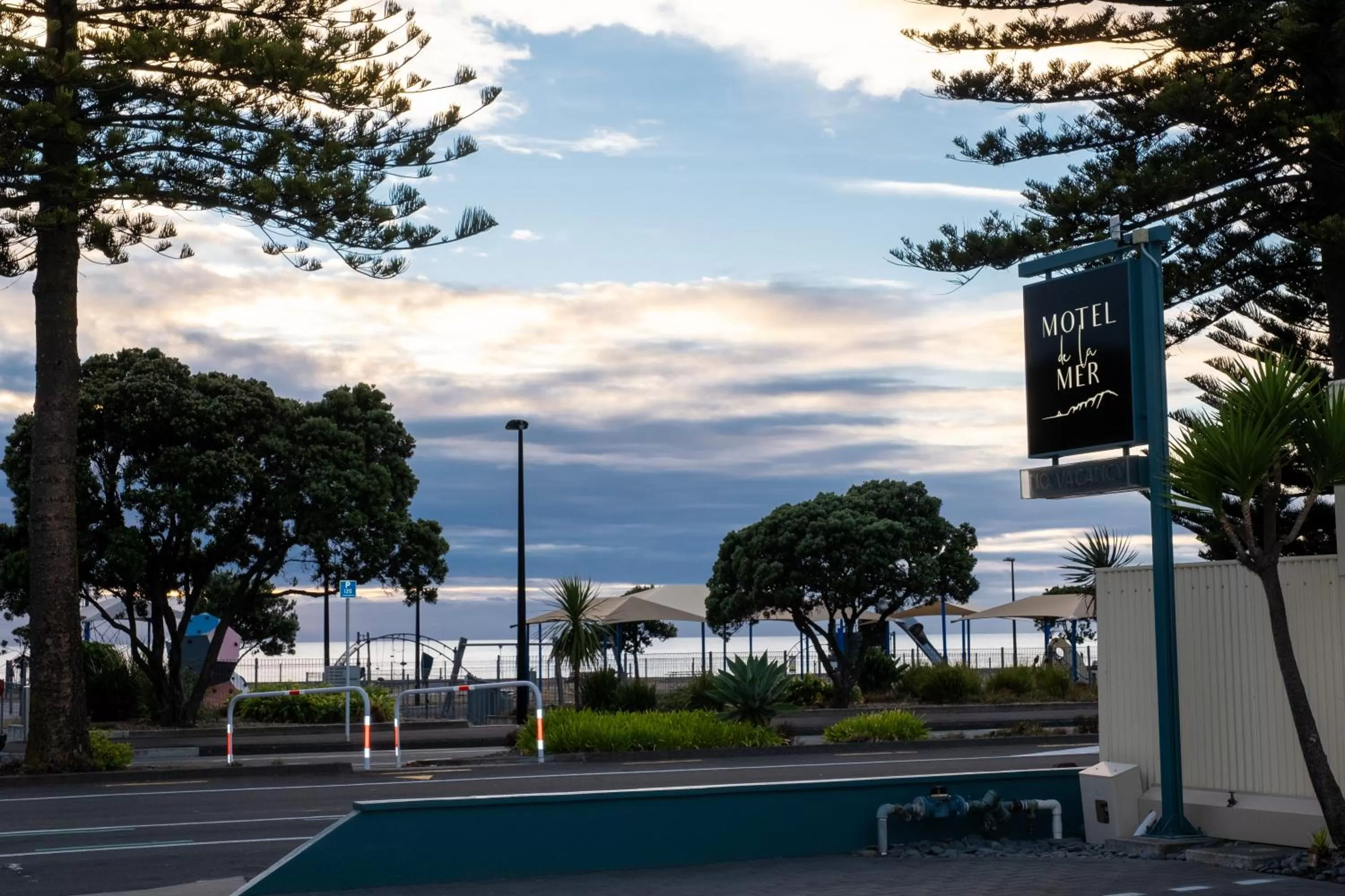 Property logo or sign in Motel de la Mer