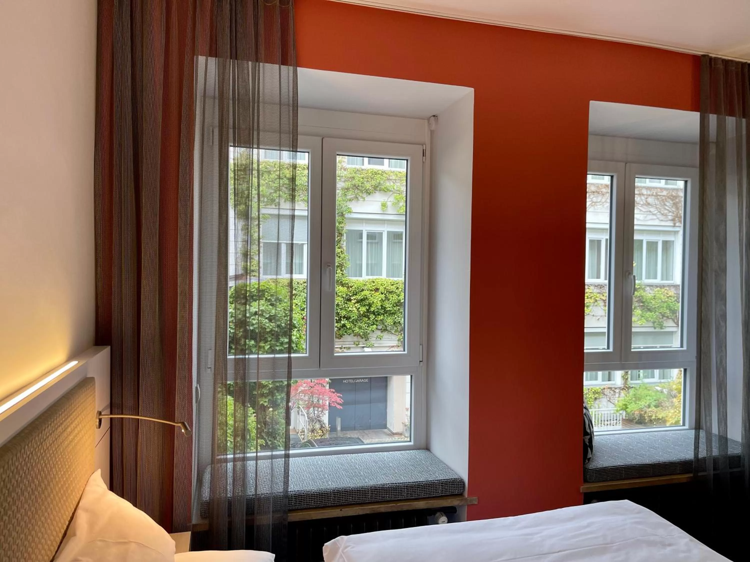 Garden view, Bed in Boutique Hotel Atrium München