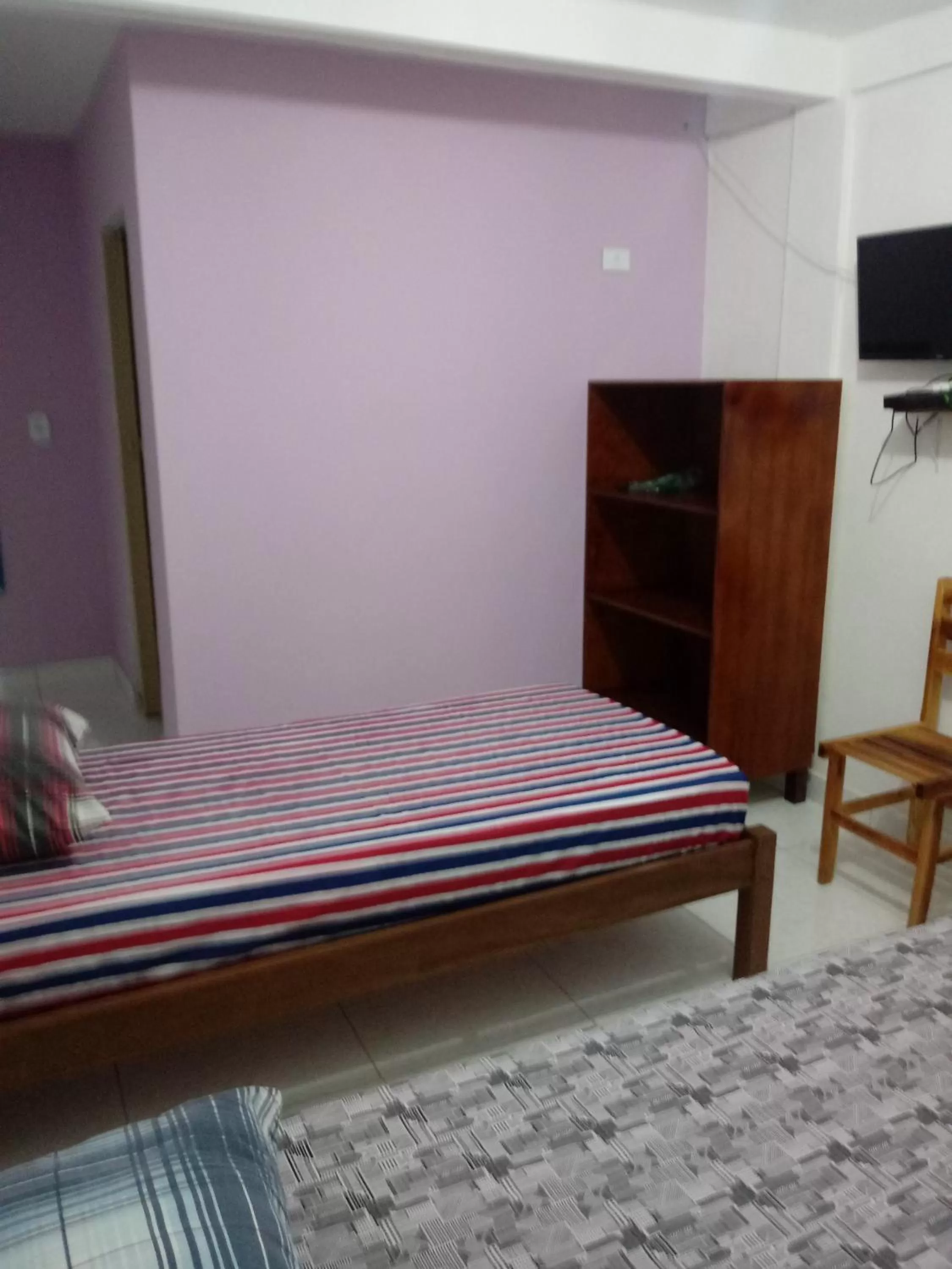 Bed in Pousada dos Ventos