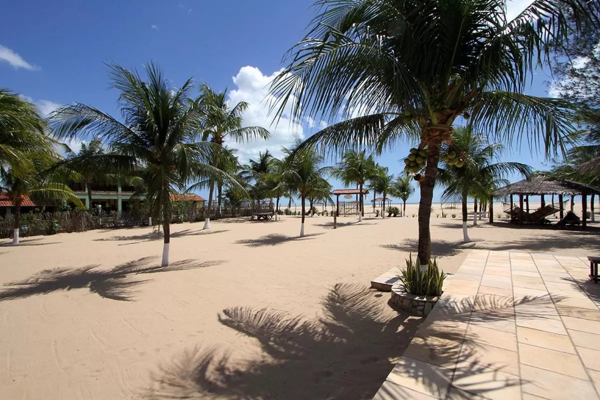 Garden, Beach in Pousada Recanto da Praia