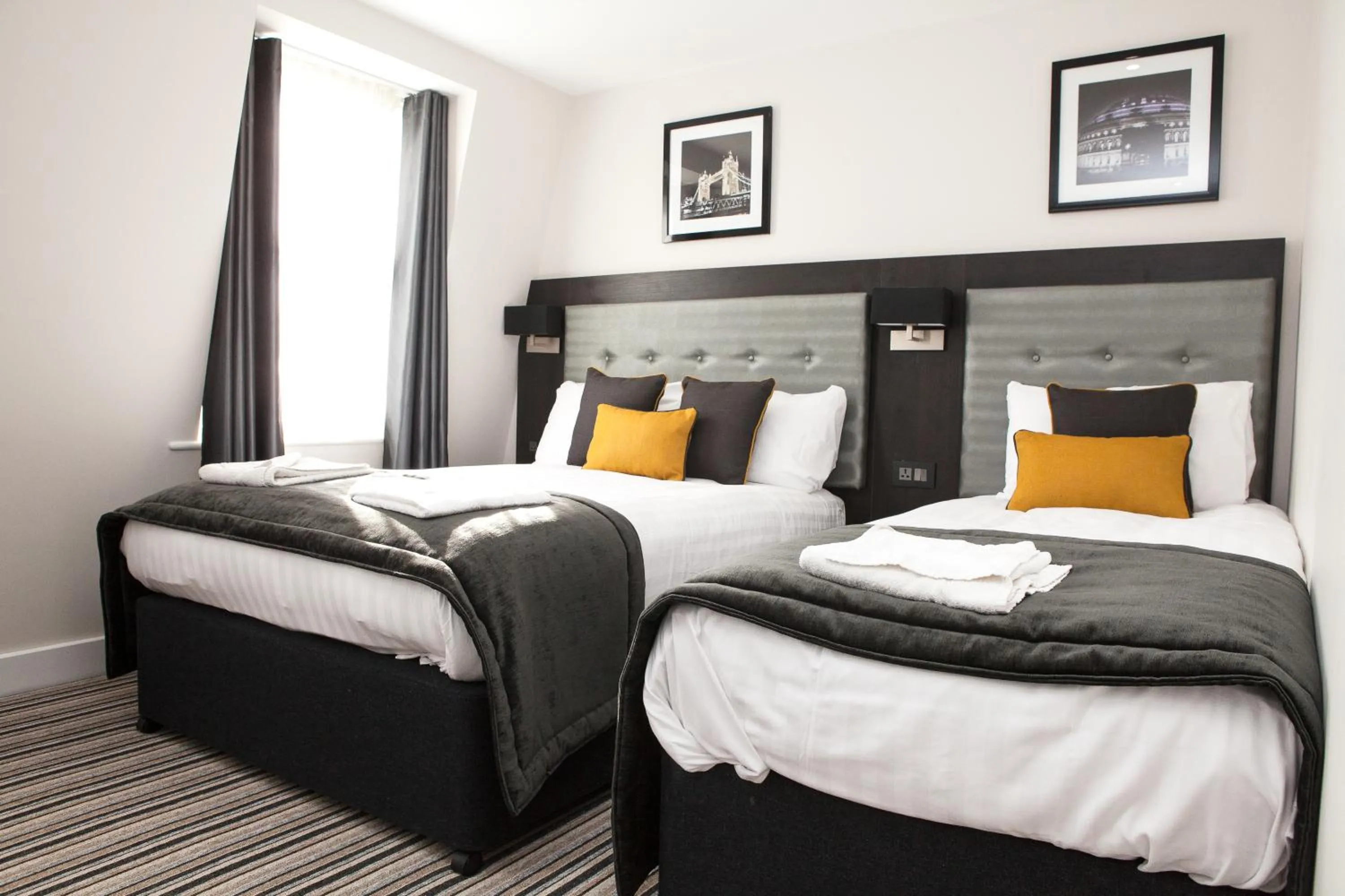 Photo of the whole room, Bed in The Tudor Inn Hotel