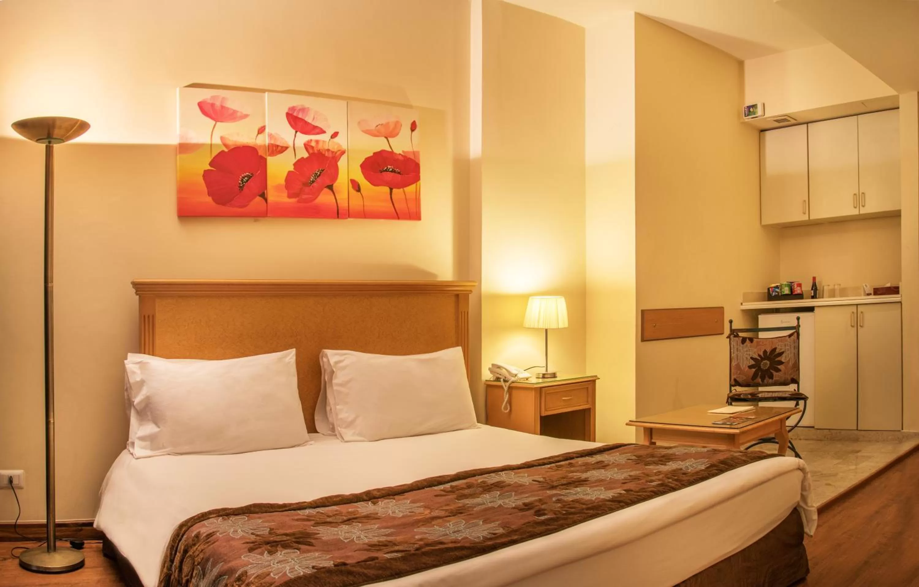 Bed in Bella Riva Hotel