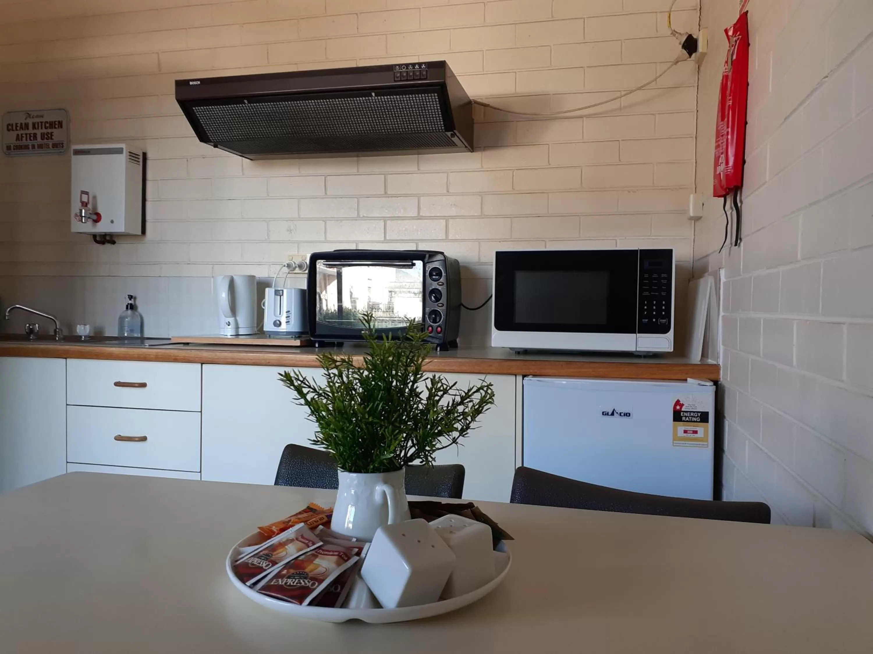 Communal kitchen in Crest Motor Inn