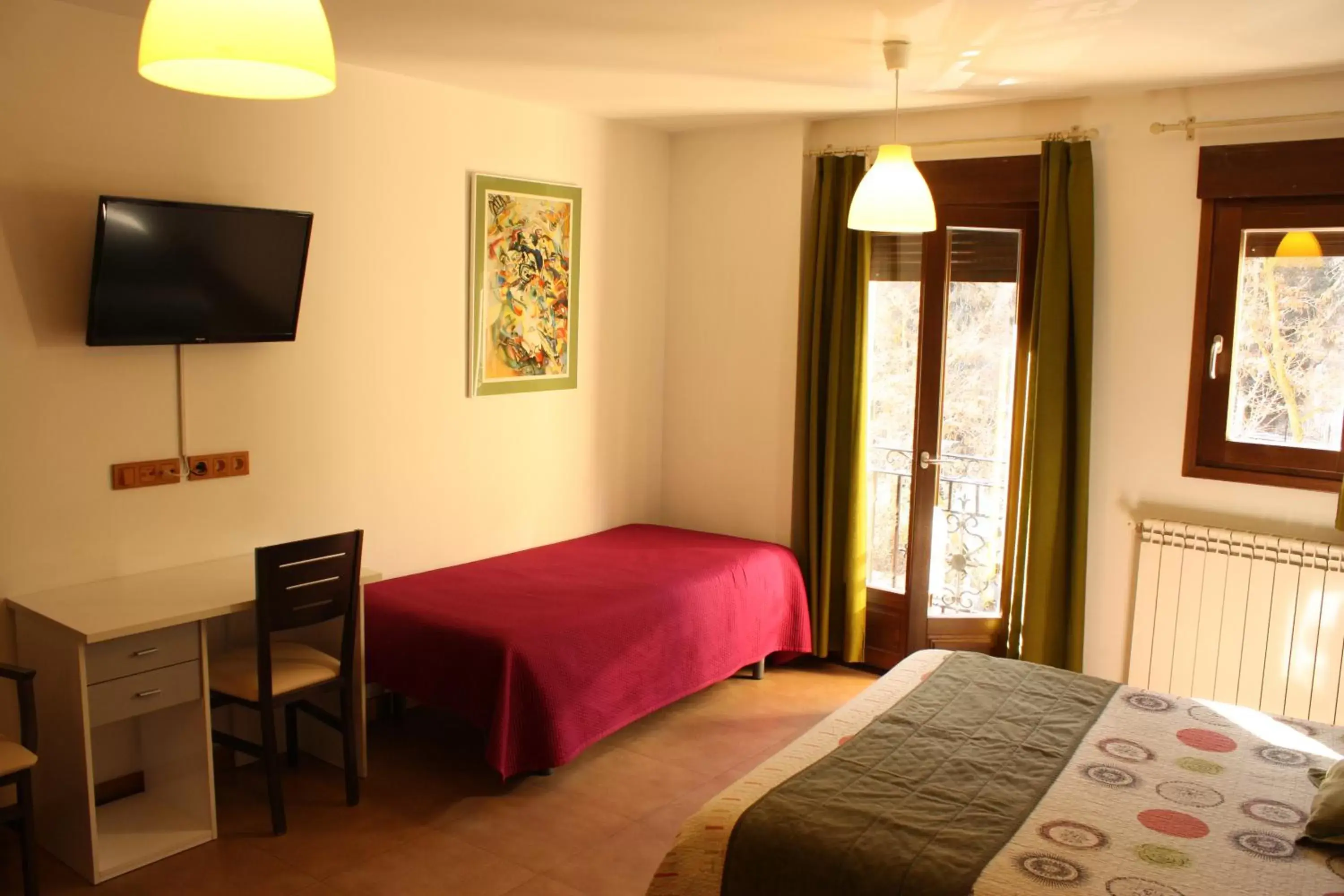 Triple Room (3 Adults) in Hostal La Ribera del Júcar Triple Room (3 Adults) in Hostal La Ribera del Júcar