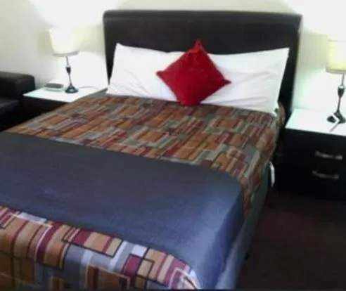 Bed in Orbost Country Man Motor Inn