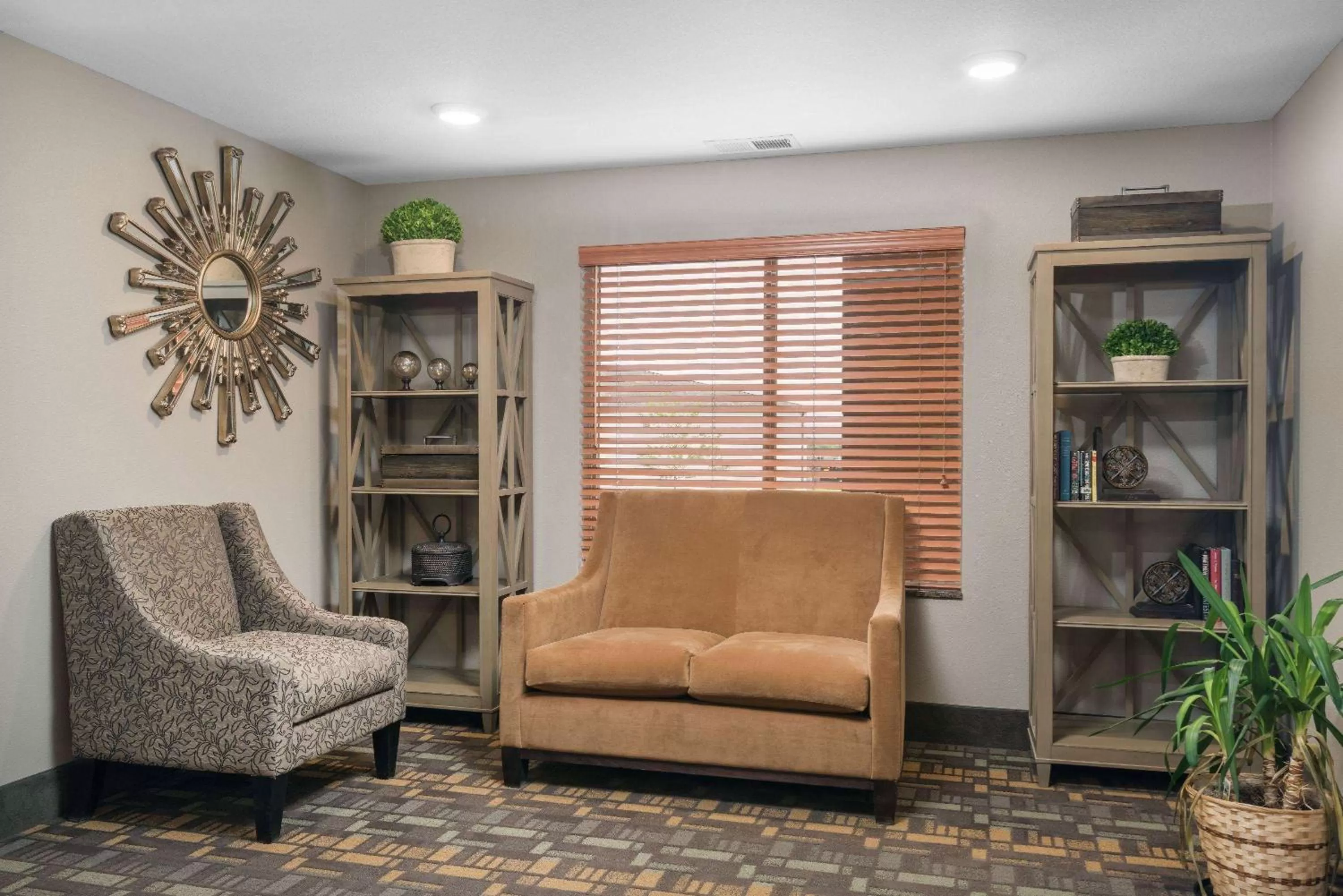 Seating area in AmericInn by Wyndham Hartford SD