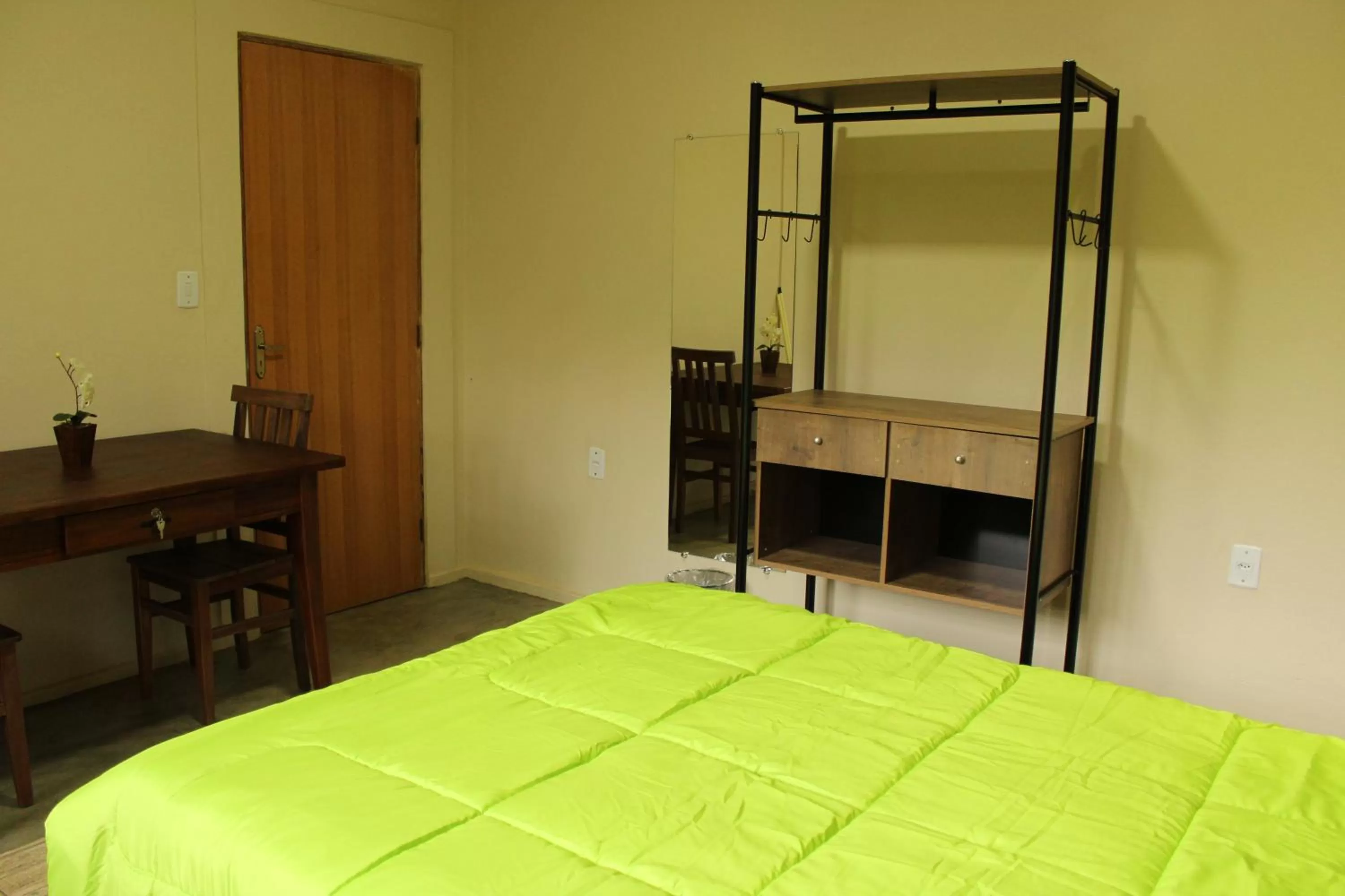 Bed in Pousada Morro dos Ventos