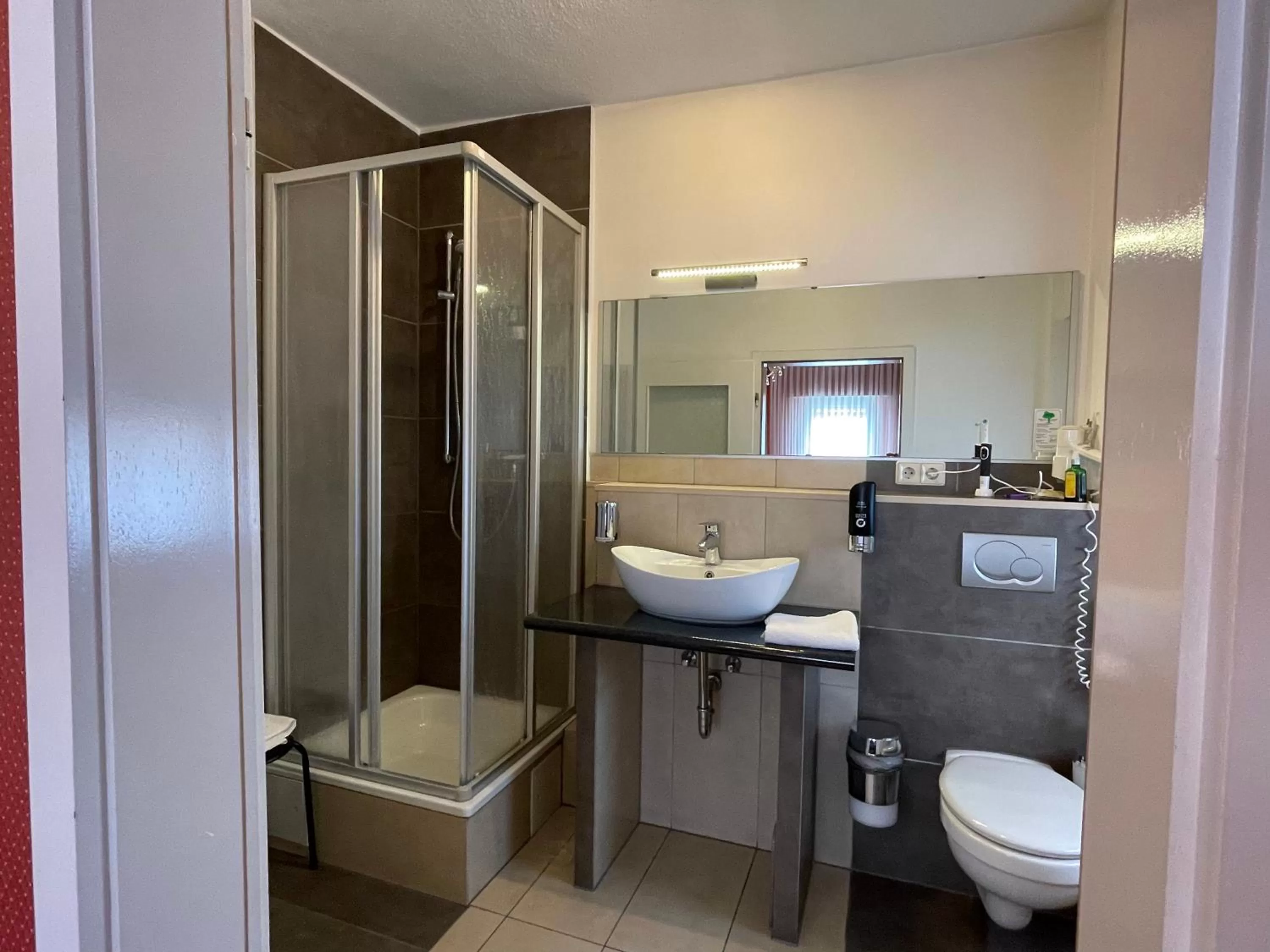 Bathroom in Hafner Hotel- Apartment