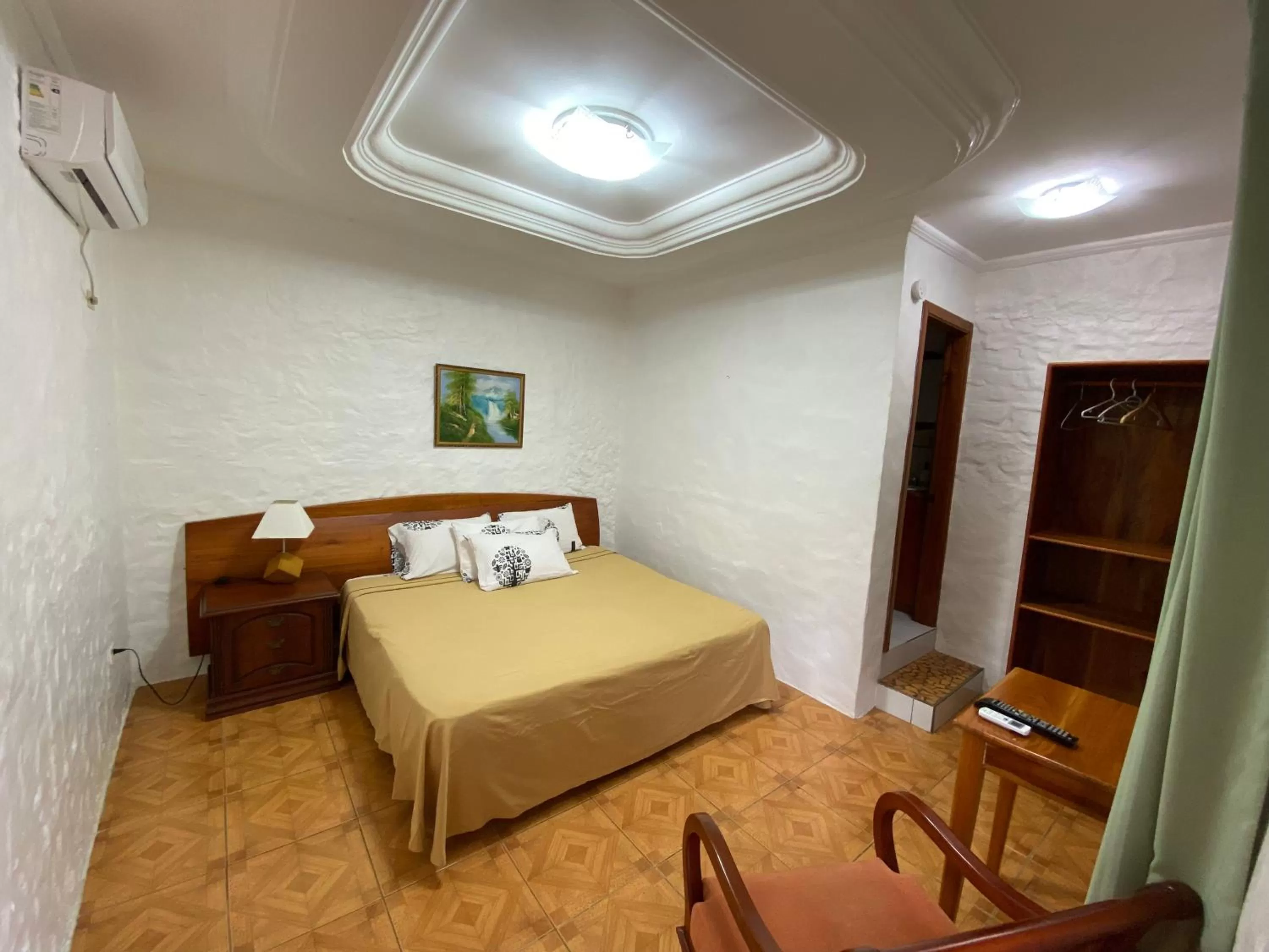 Bed in La Peregrina Galapagos B&B