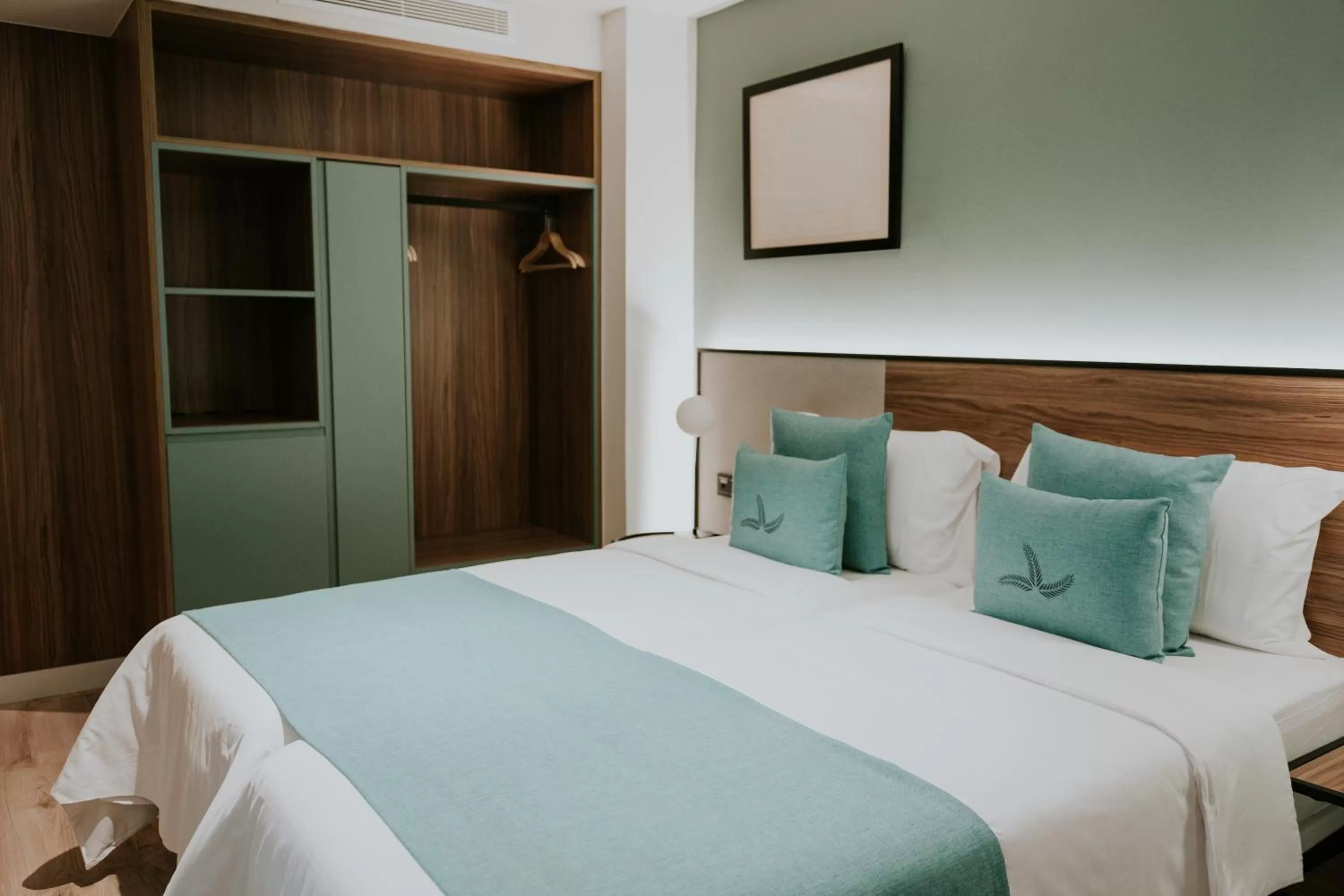 Bed in Catalina Plaza Hotel Sostenible