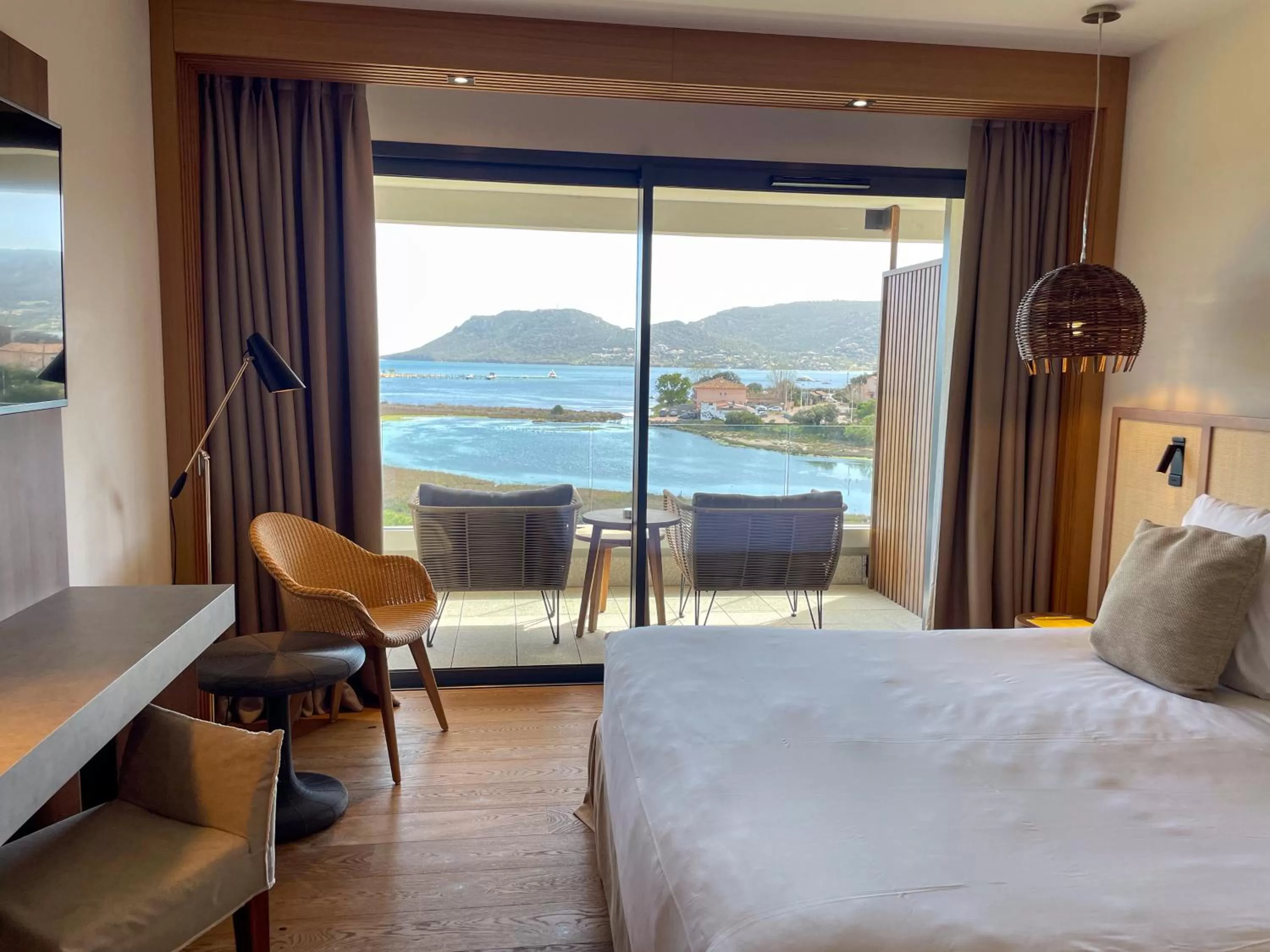 Photo of the whole room, Bed in Golden Tulip Porto-Vecchio