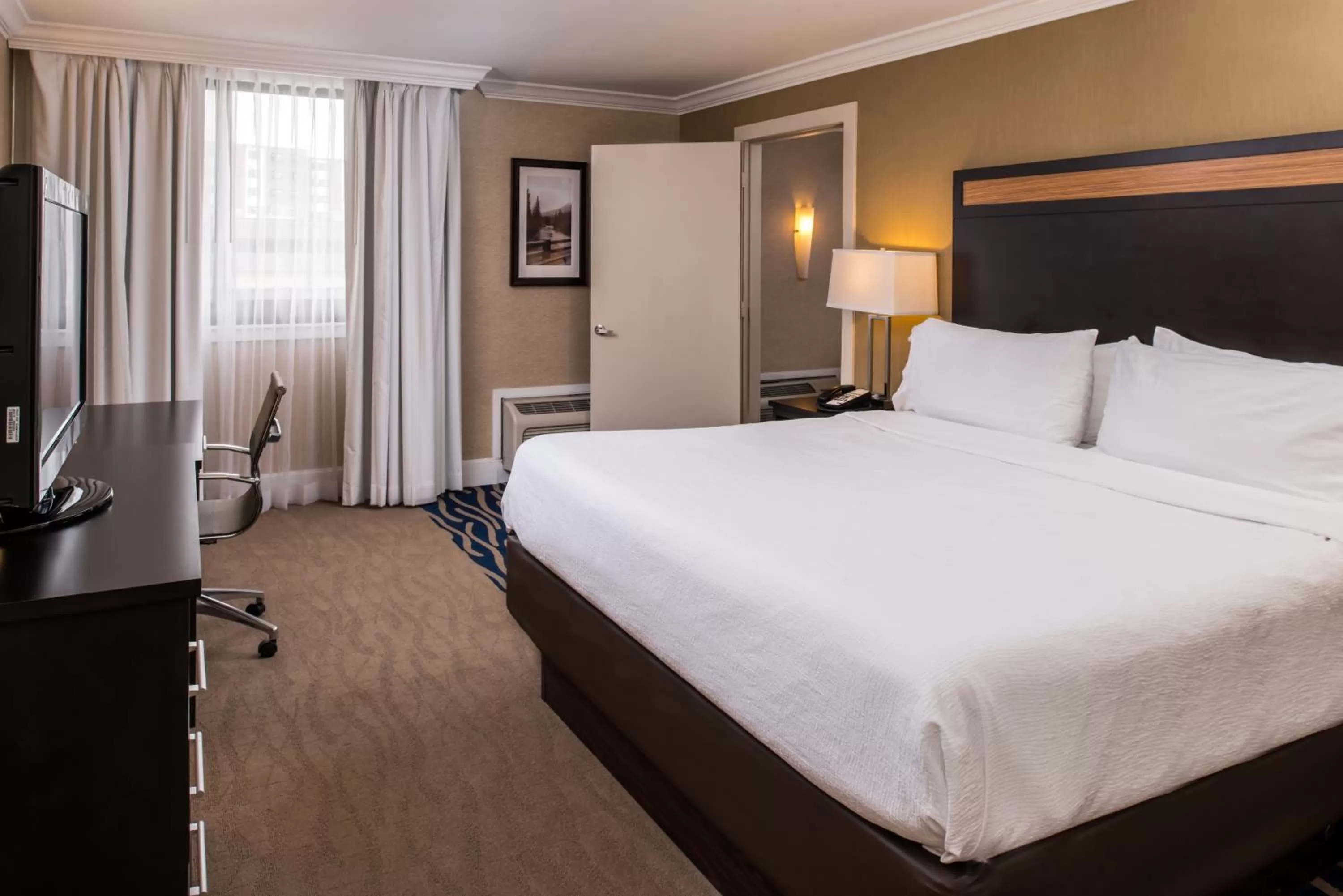 Seating area, Bed in Doubletree By Hilton Concord Downtown