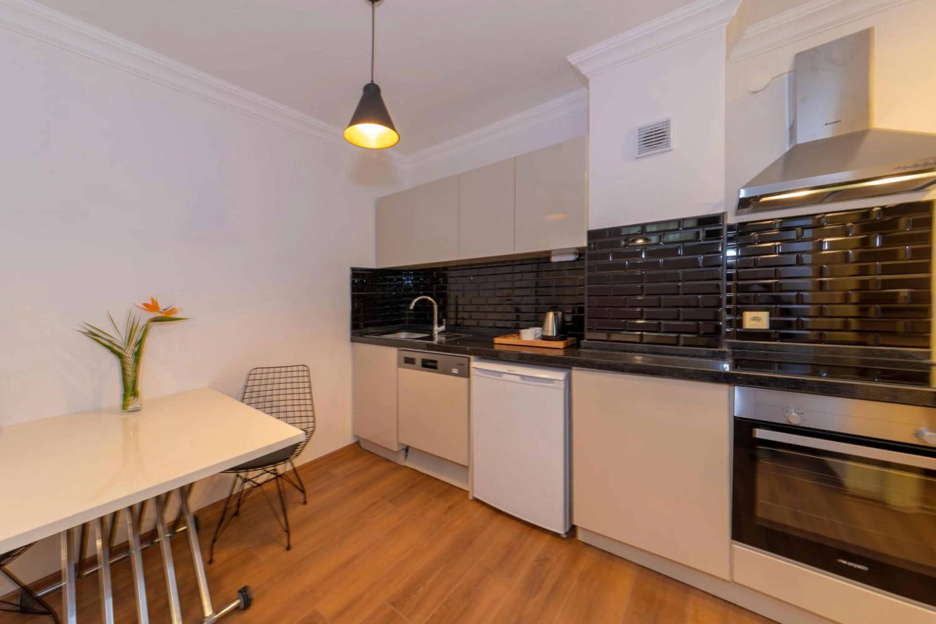 Kitchen or kitchenette in Joy Suites