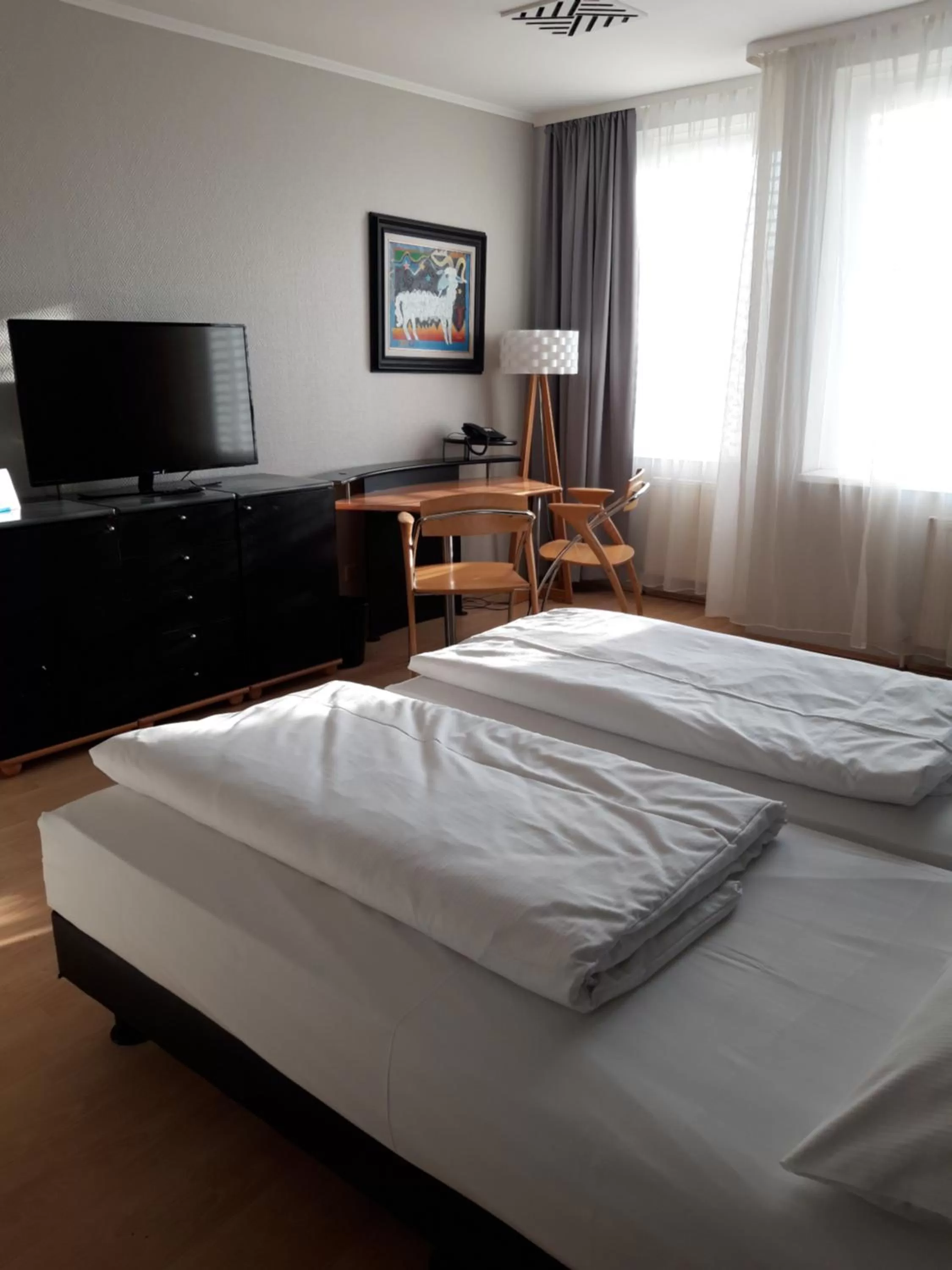 Bedroom in City Hotel Berlin East