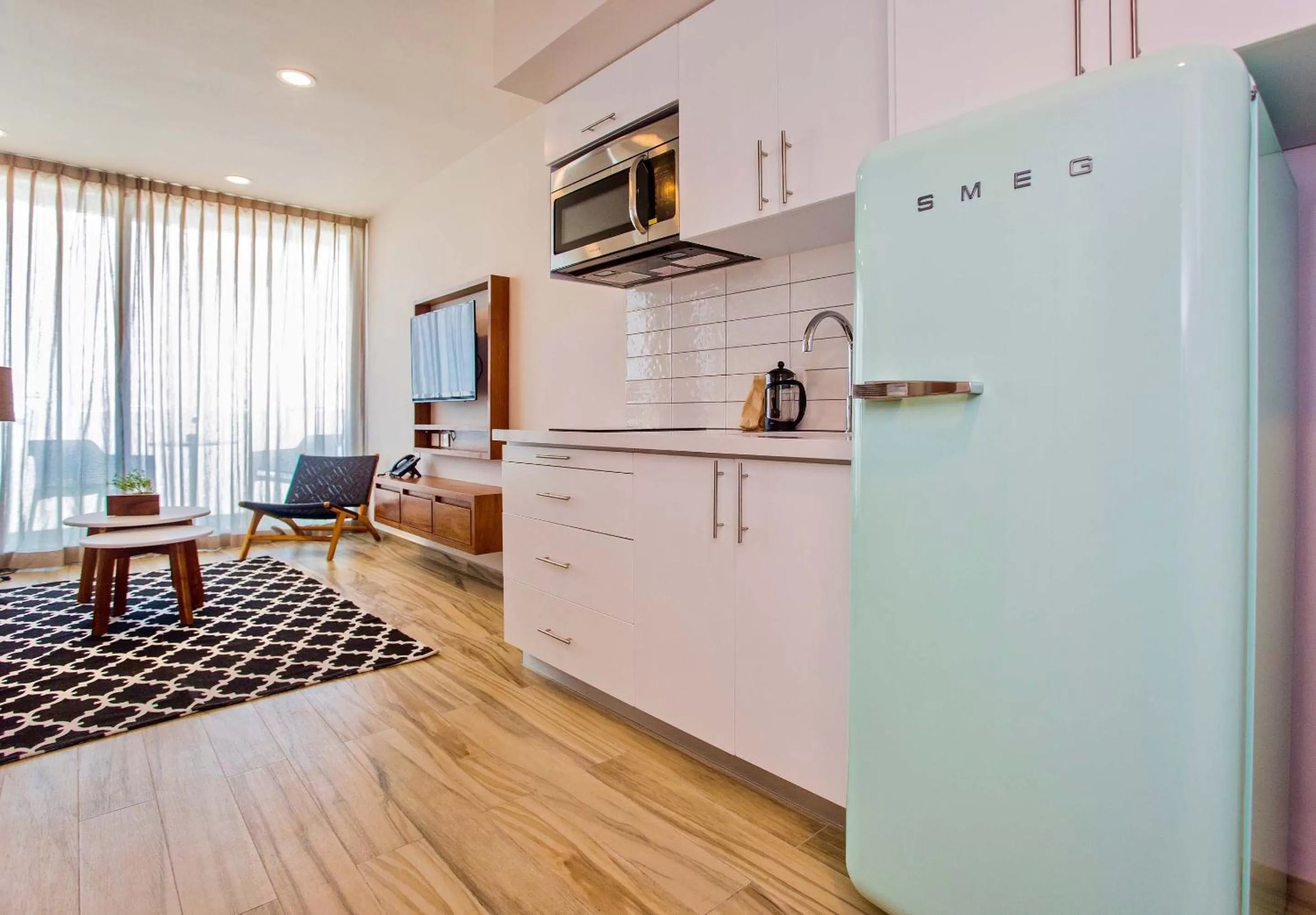 Kitchen or kitchenette in Newport House Playa Boutique Hotel