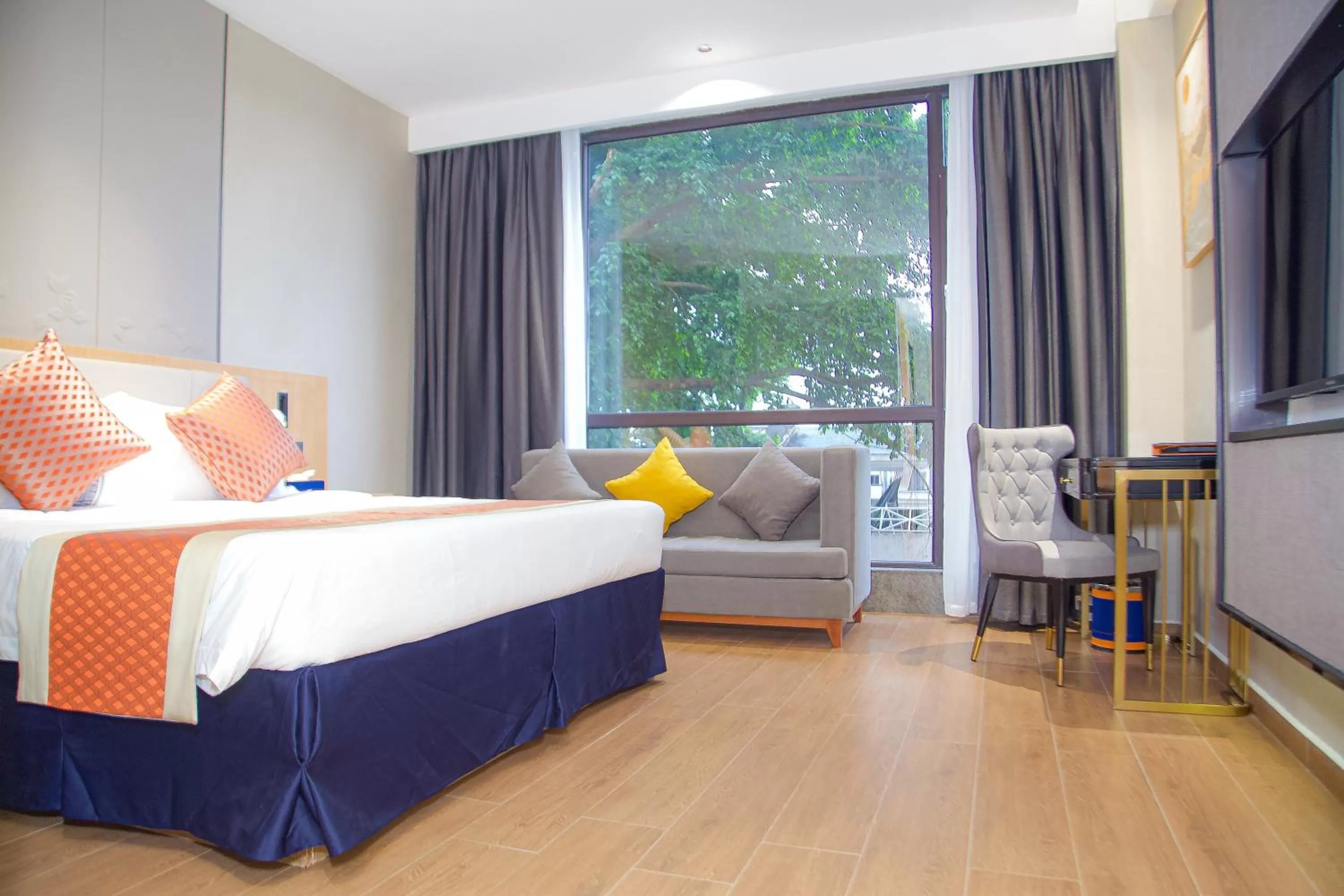 Photo of the whole room in Hôtel FAMILLE MONDIALE