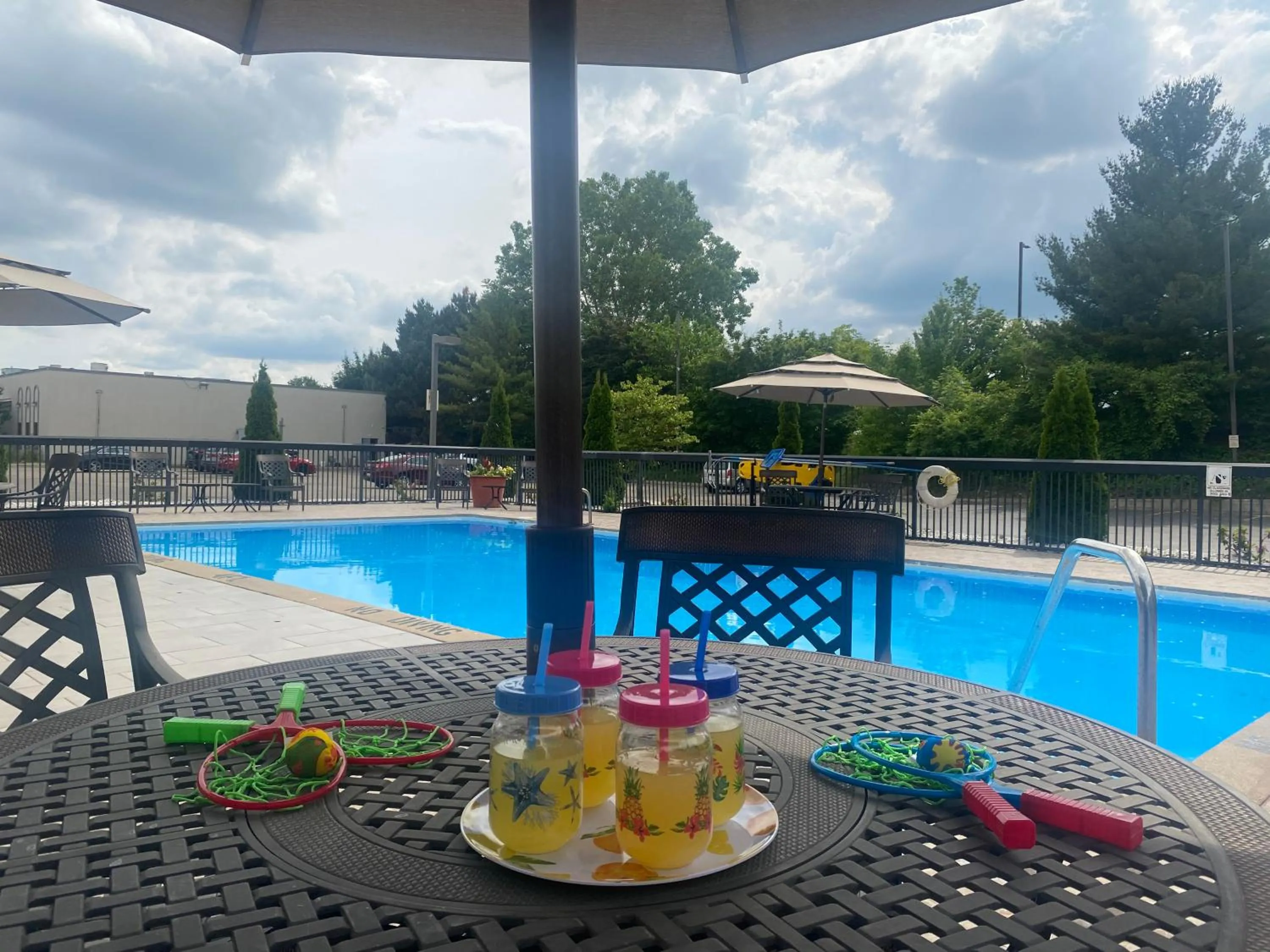 Swimming pool in Clarion Inn & Suites Grand Rapids Airport