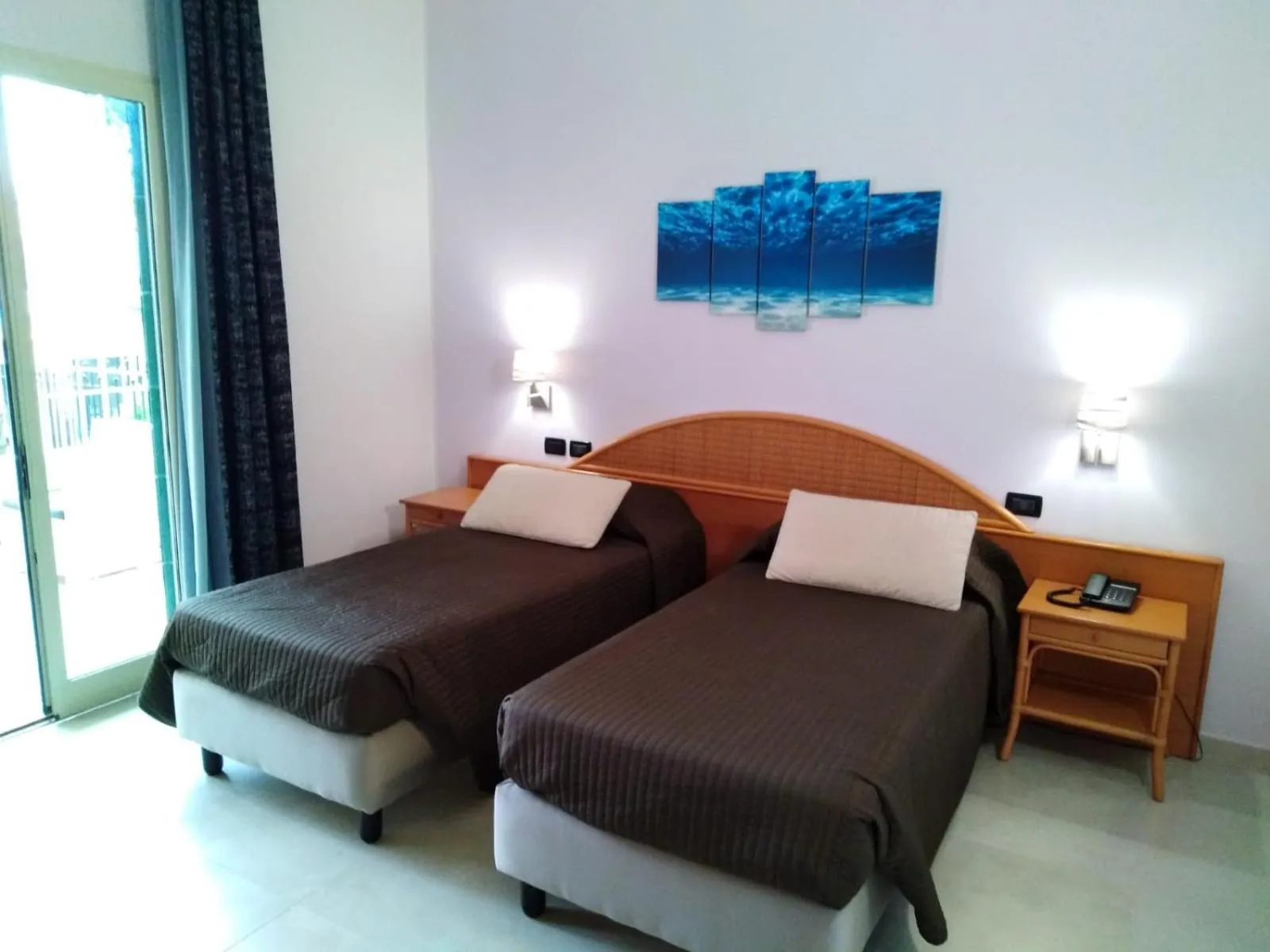 Bed in Hotel Corallo