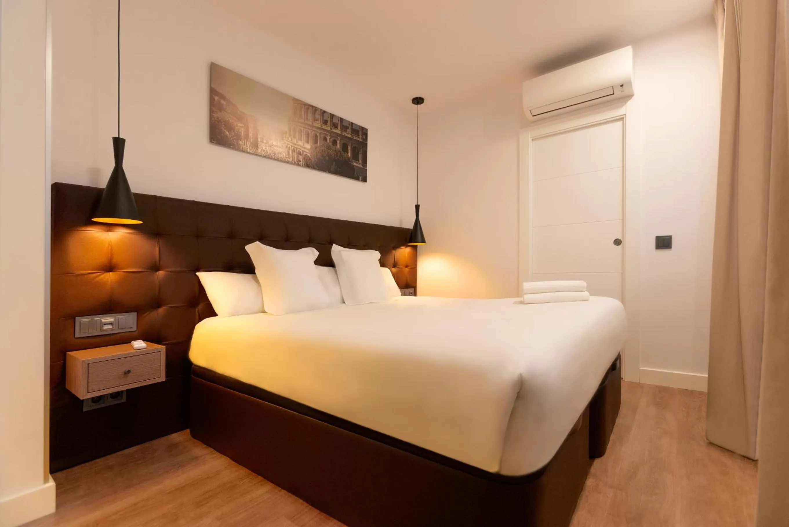 Bed in Woohoo Rooms Hortaleza