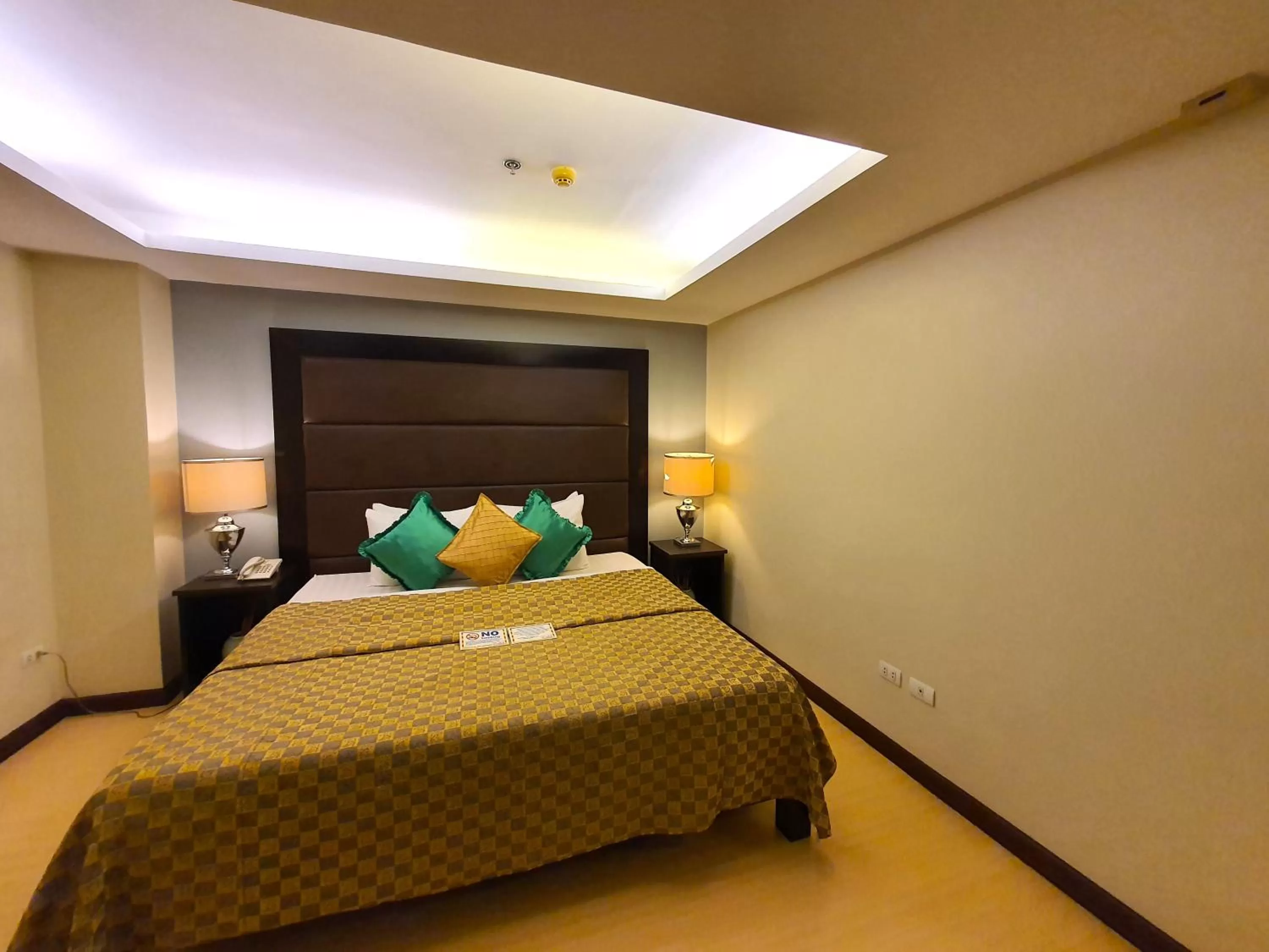 Bed in Festive Hotel Makati
